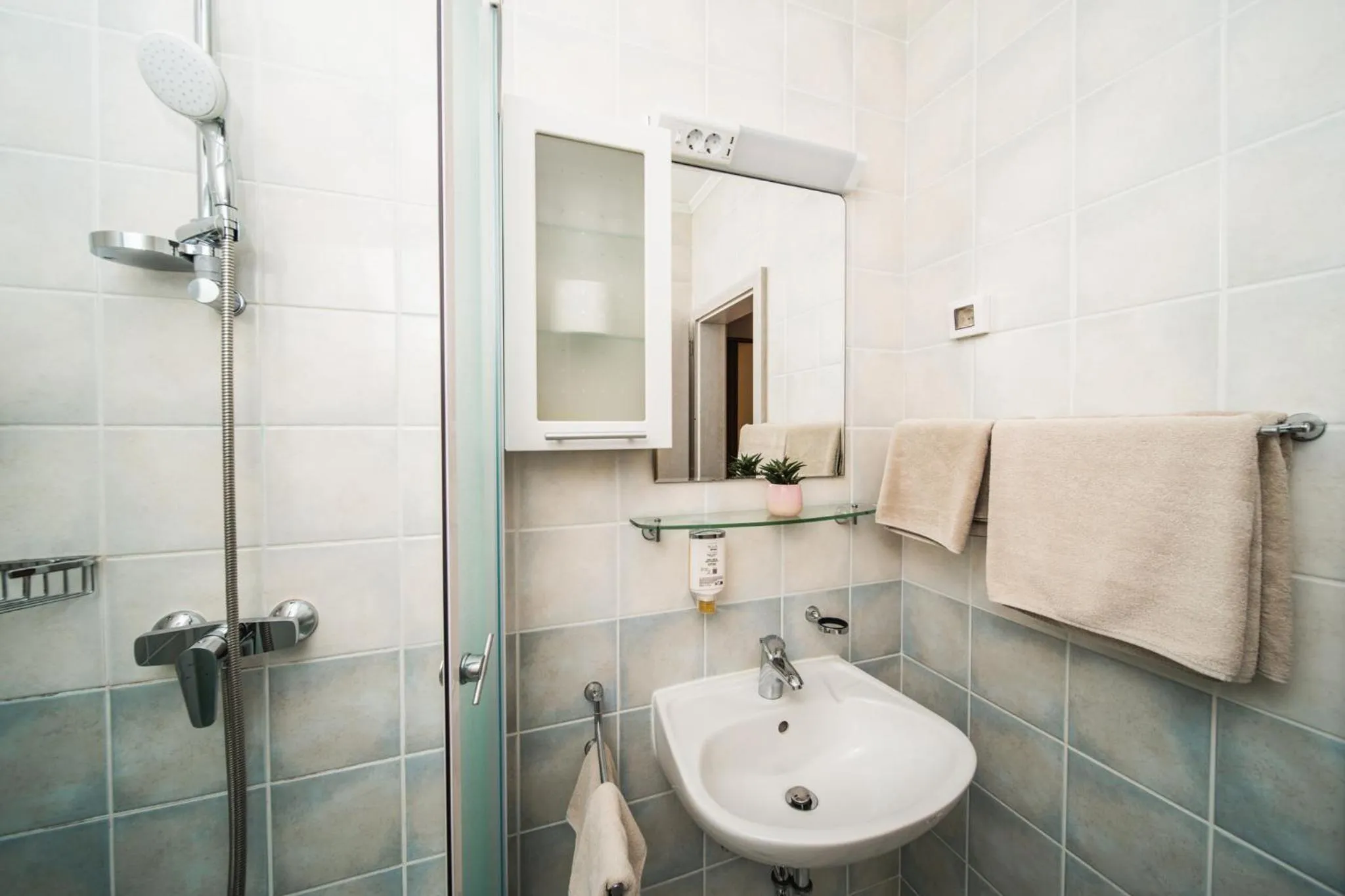 Shower in Pervanovo Apartments with Free Parking