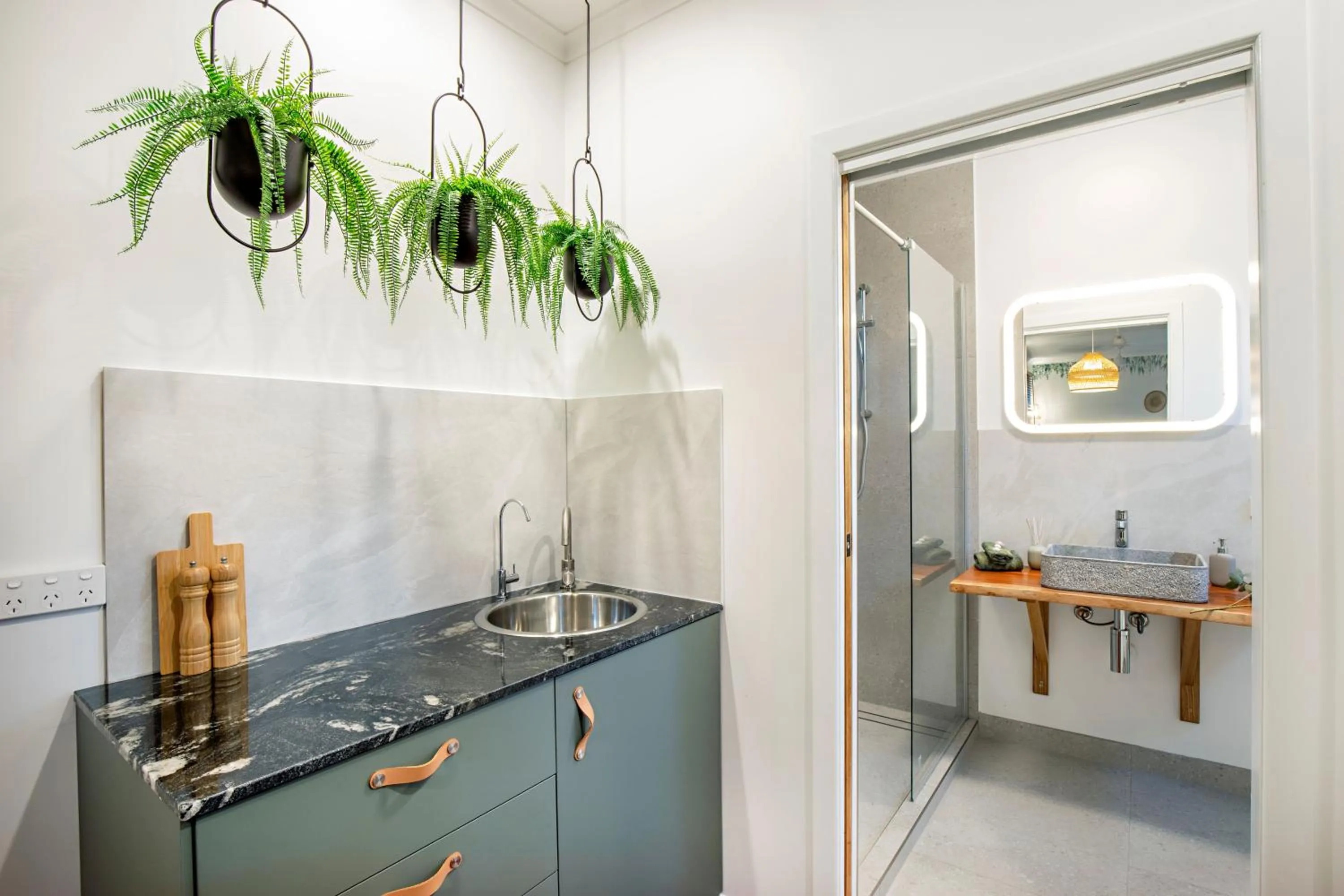 Kitchen or kitchenette in Airlie Beach Eco Cabins - Adults Only