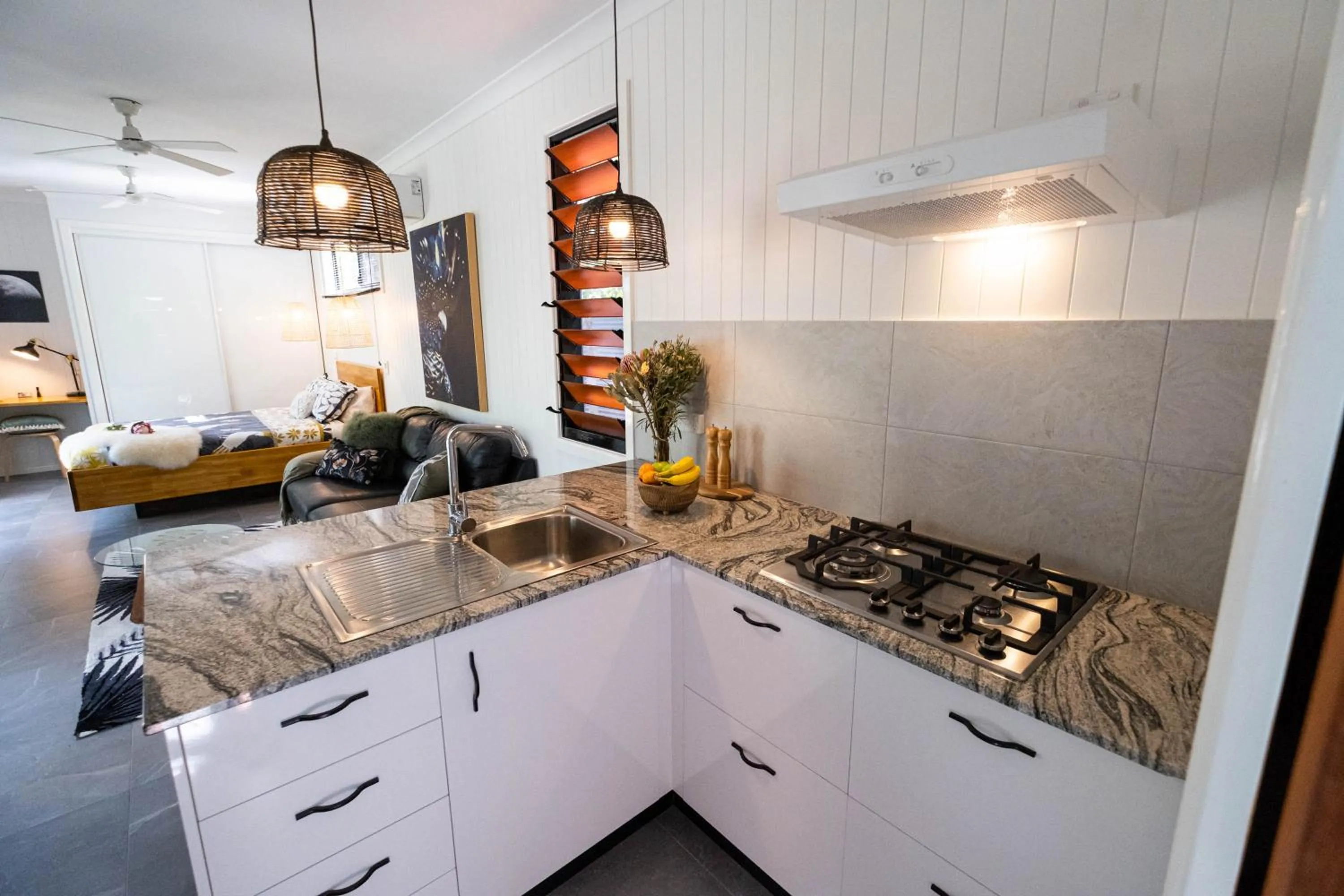 Kitchen or kitchenette in Airlie Beach Eco Cabins - Adults Only
