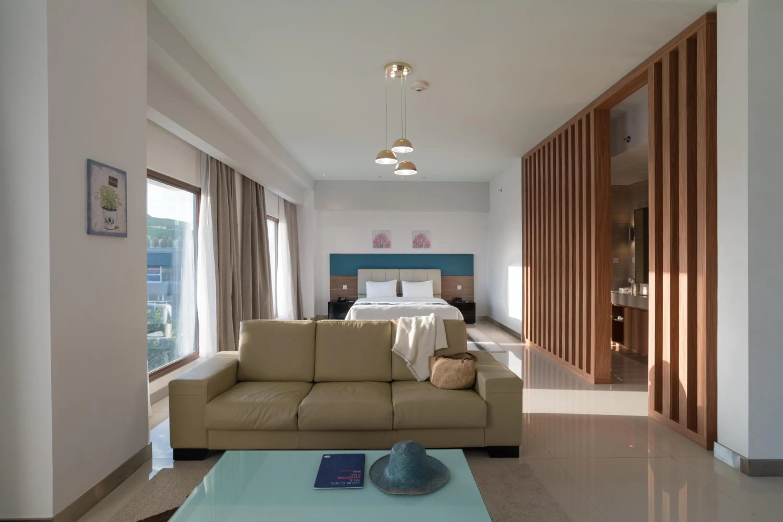 Living room, Bed in Holiday Inn Express Baruna by IHG