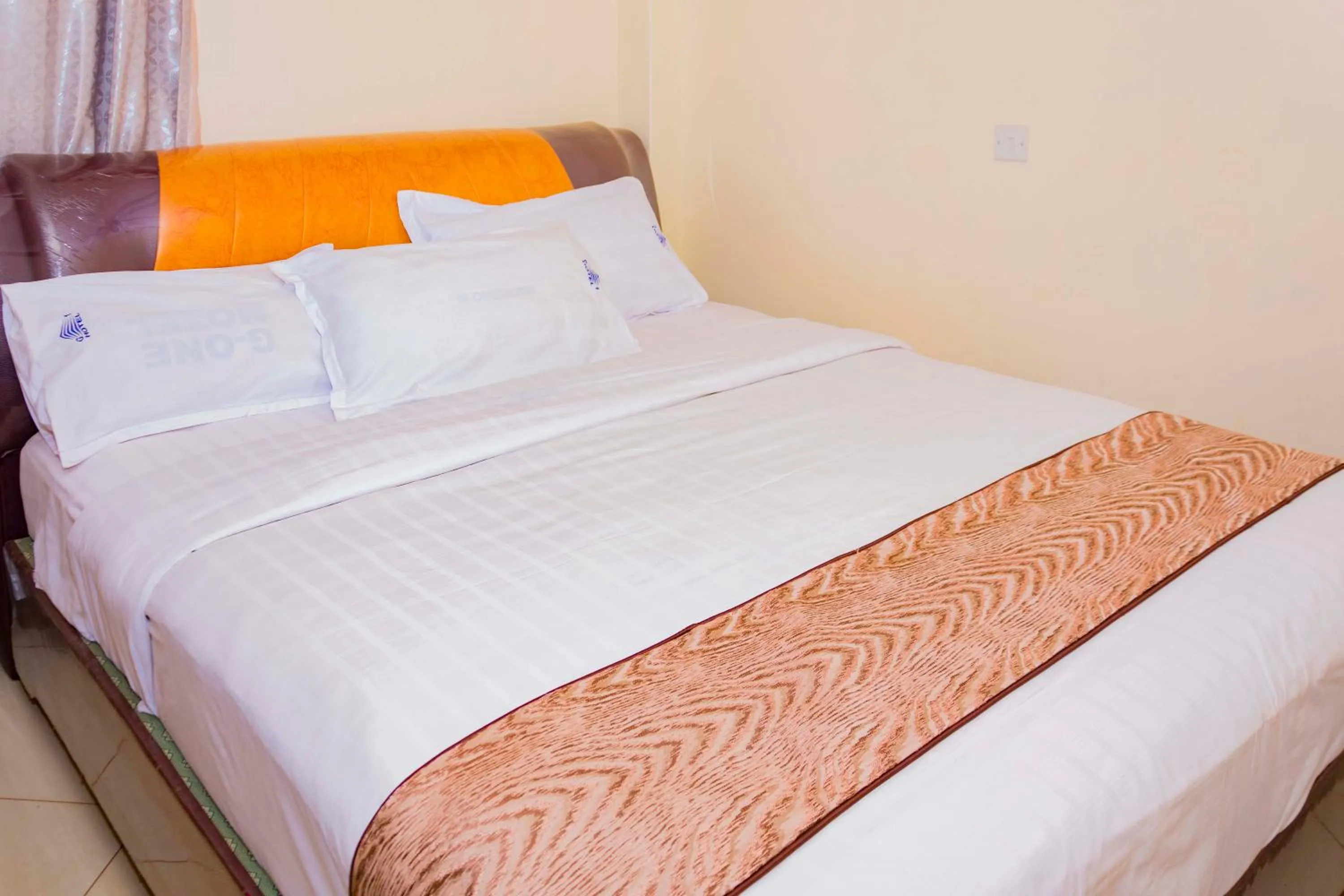 Bed in G-One Hotel Kampala