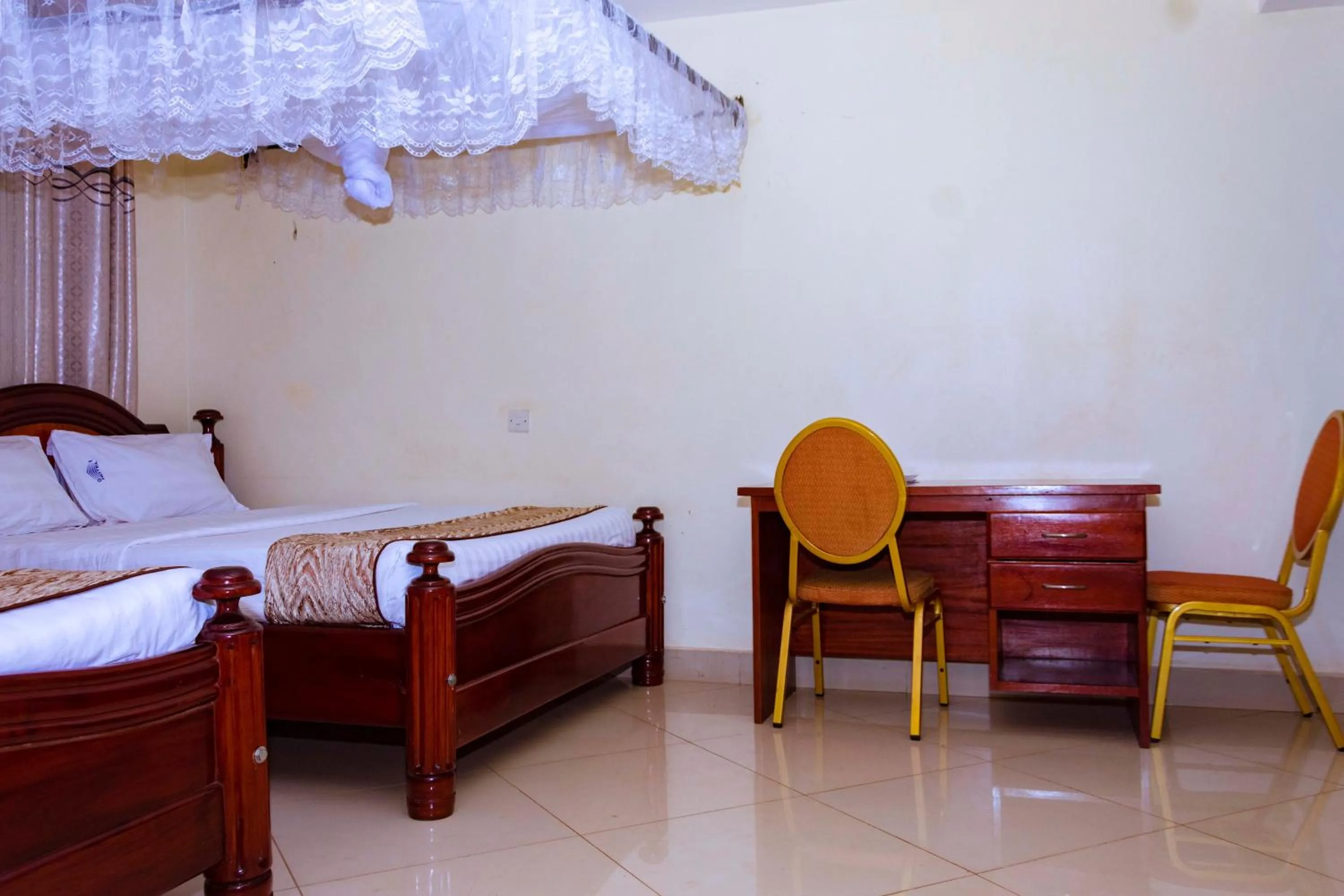 Bed in G-One Hotel Kampala