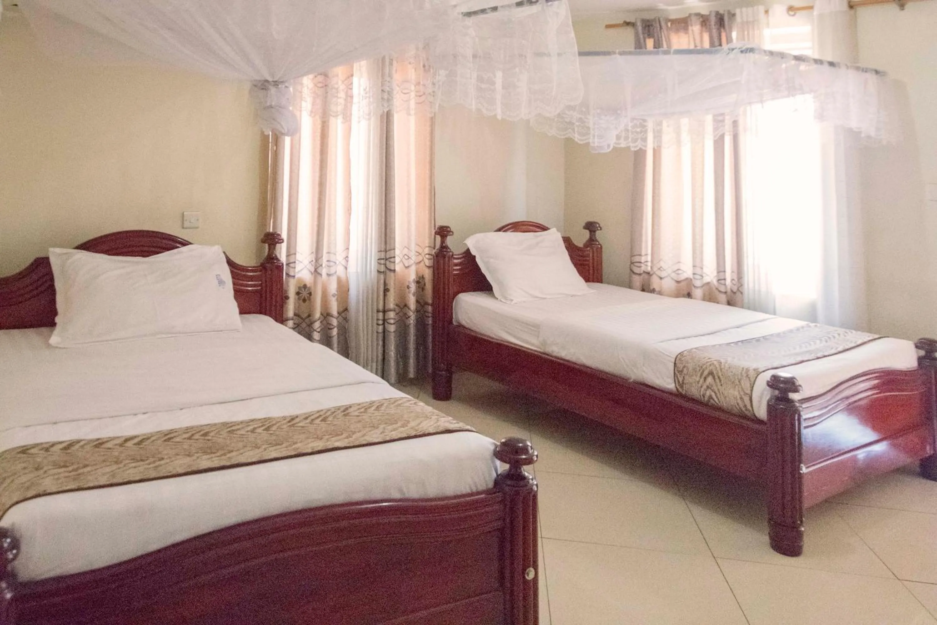 Bed in G-One Hotel Kampala