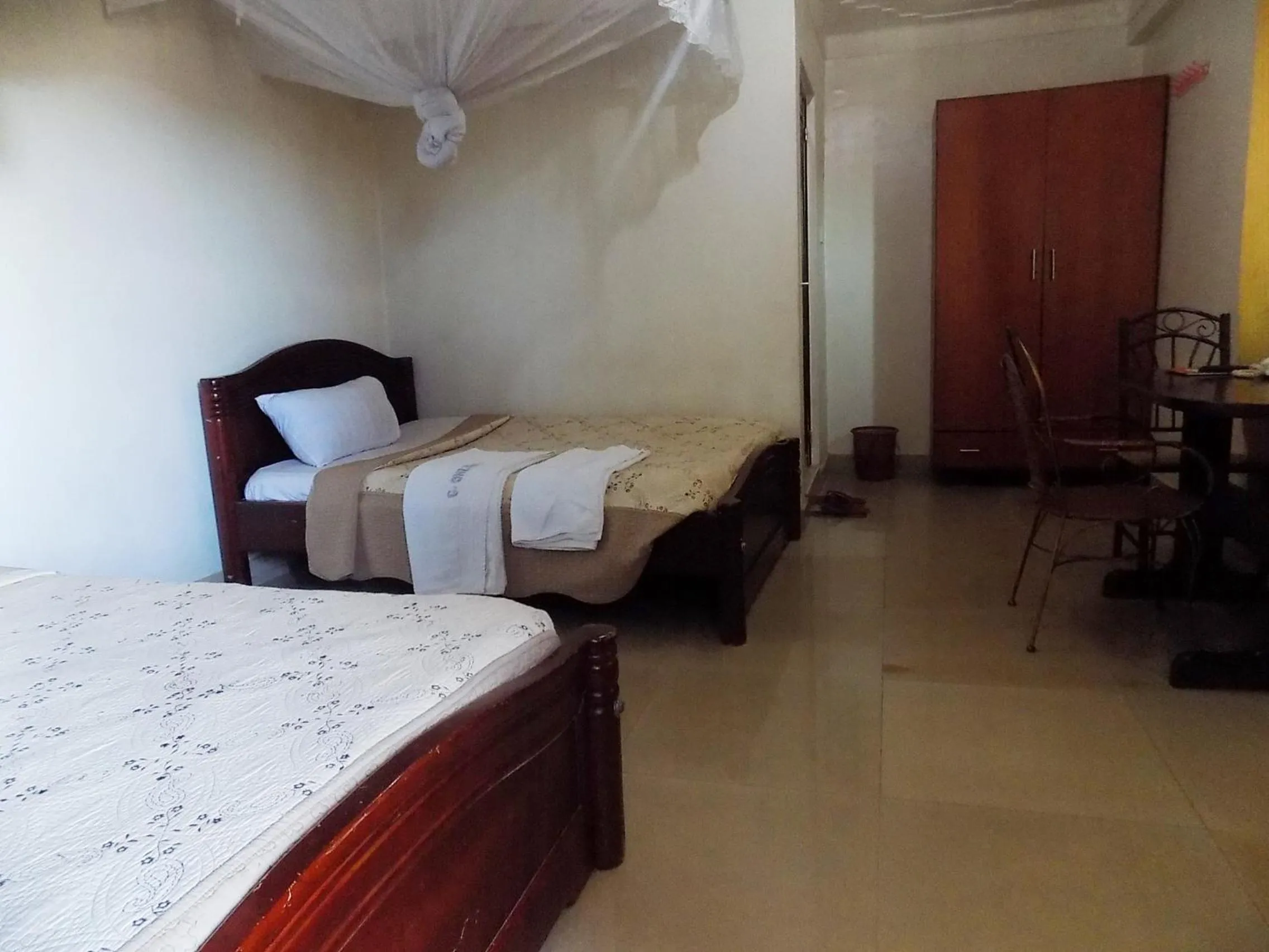 Bedroom, Bed in G-One Hotel Kampala