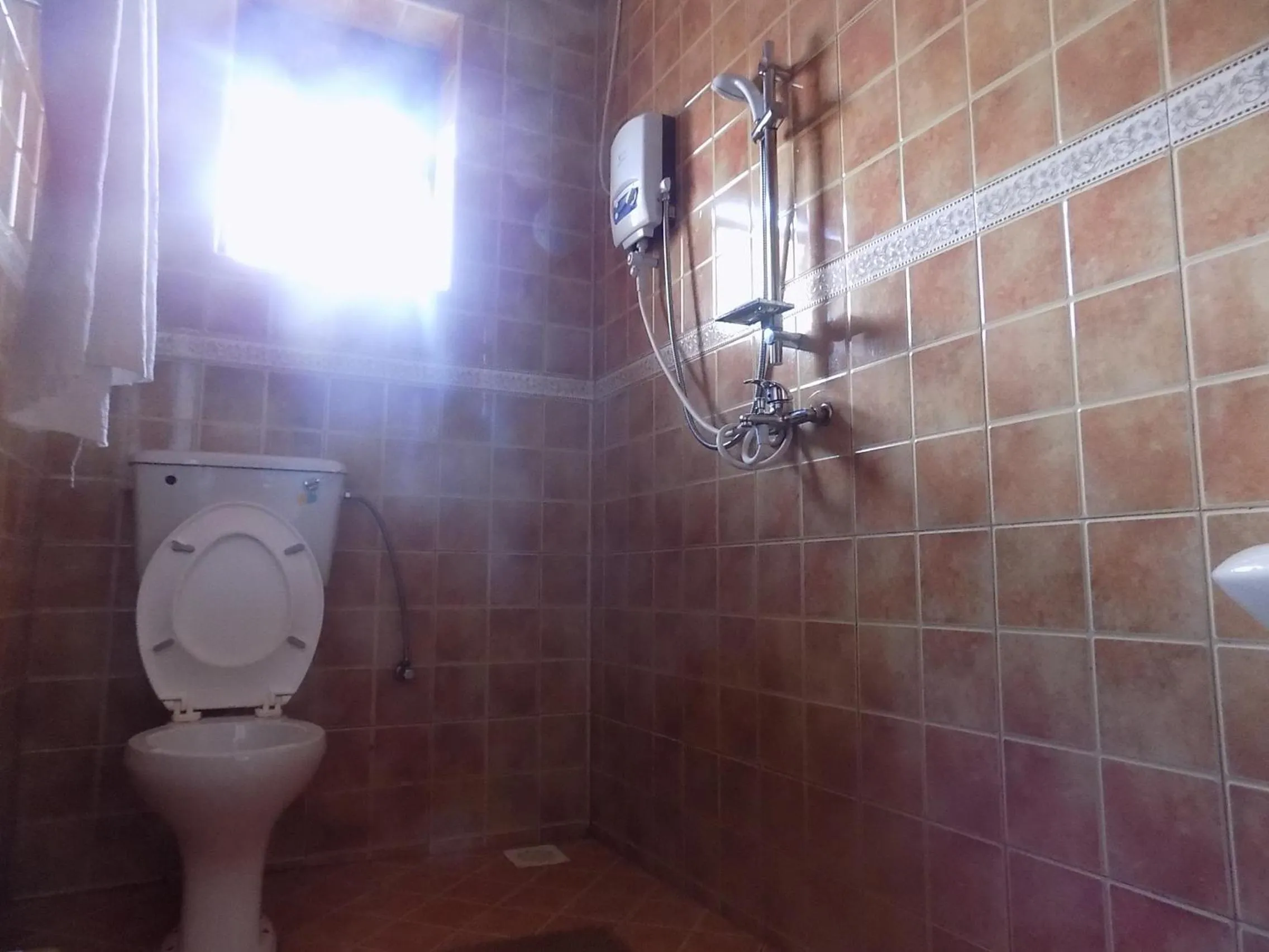 Bathroom in Olina Hotel and Apartments Kampala