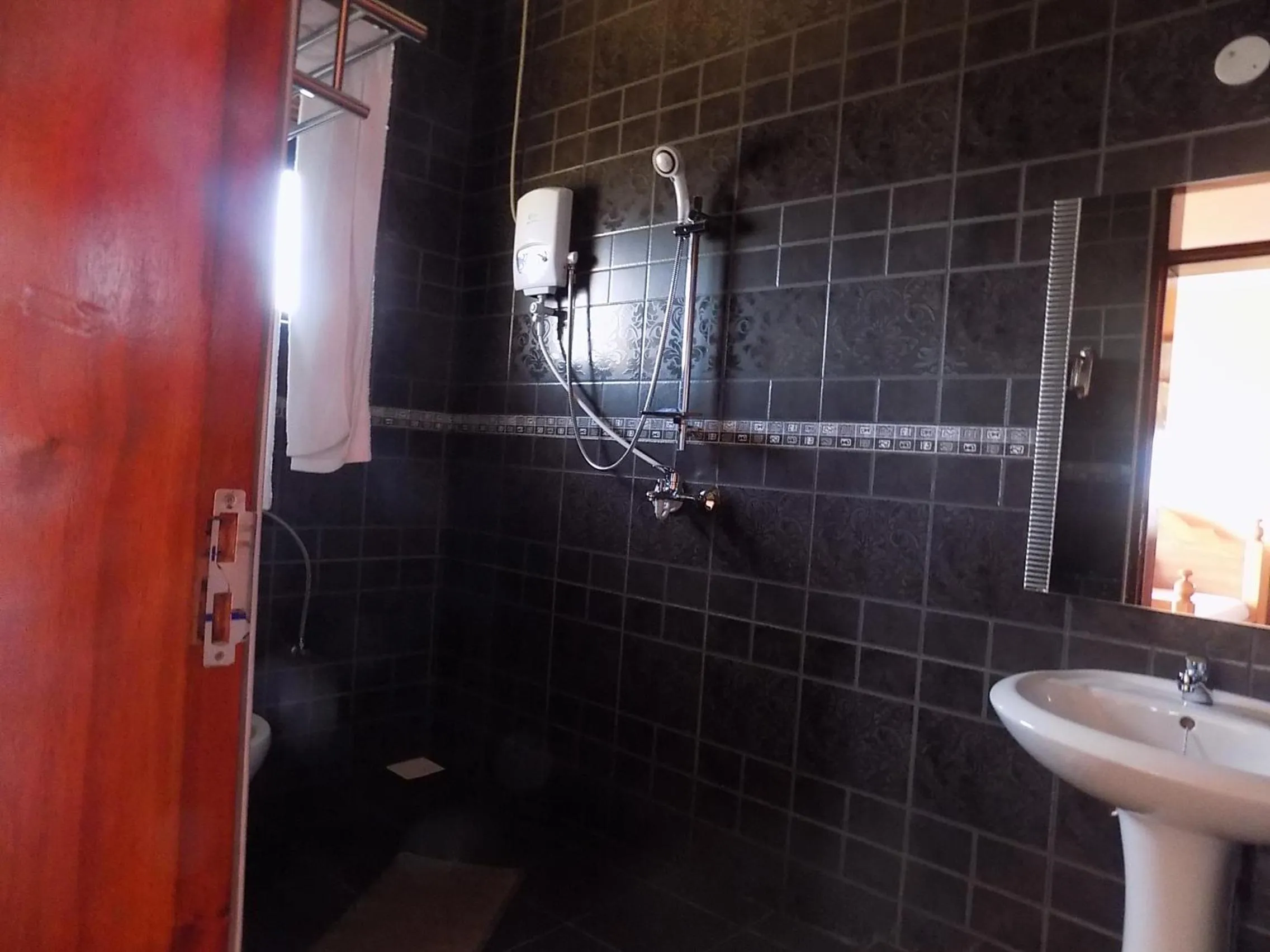 Bathroom in Olina Hotel and Apartments Kampala