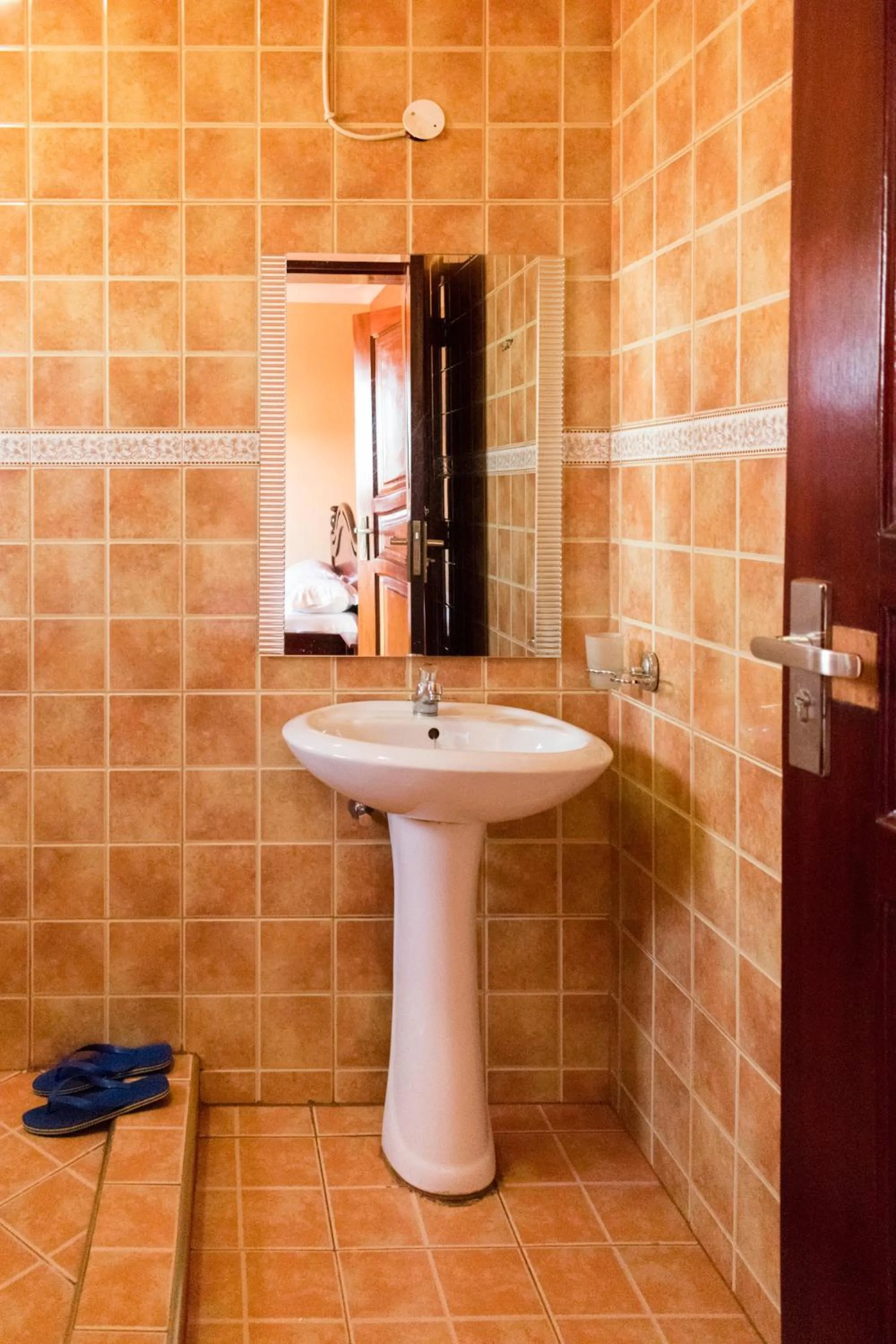 Bathroom in Olina Hotel and Apartments Kampala