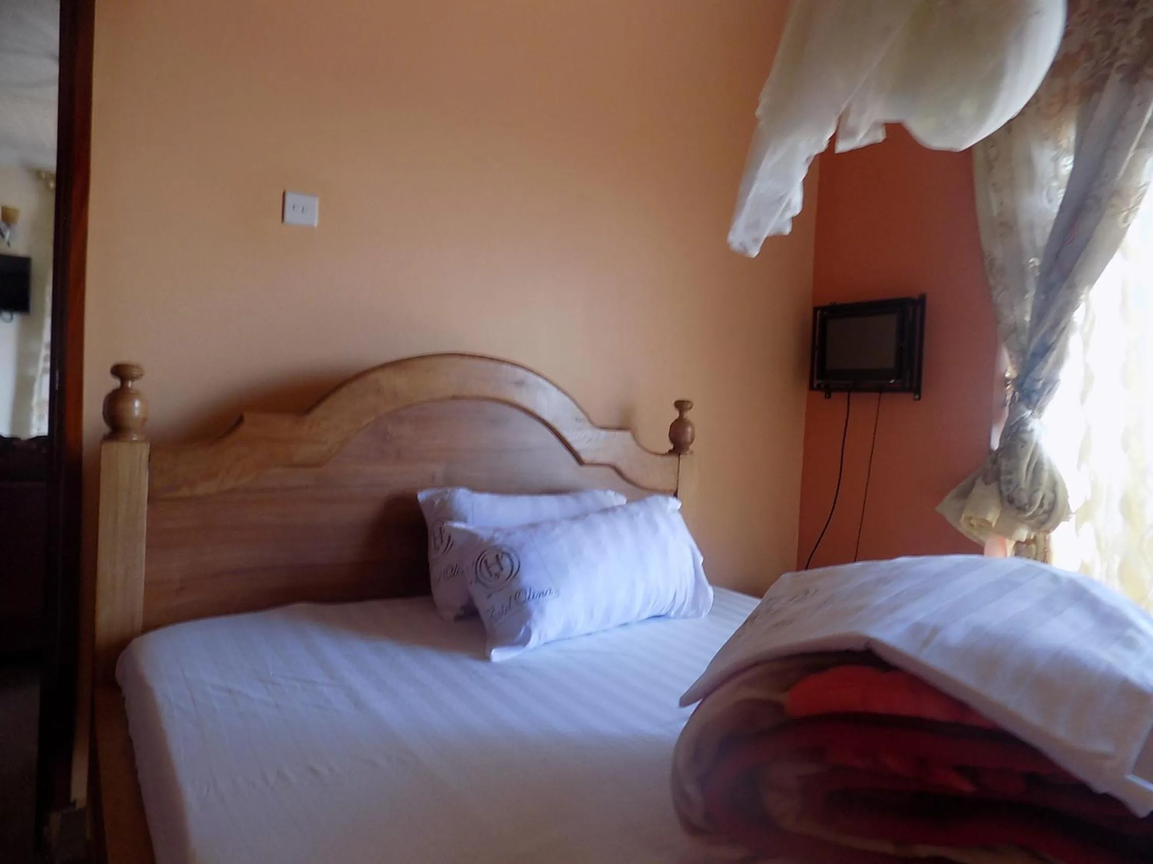 Bedroom in Olina Hotel and Apartments Kampala