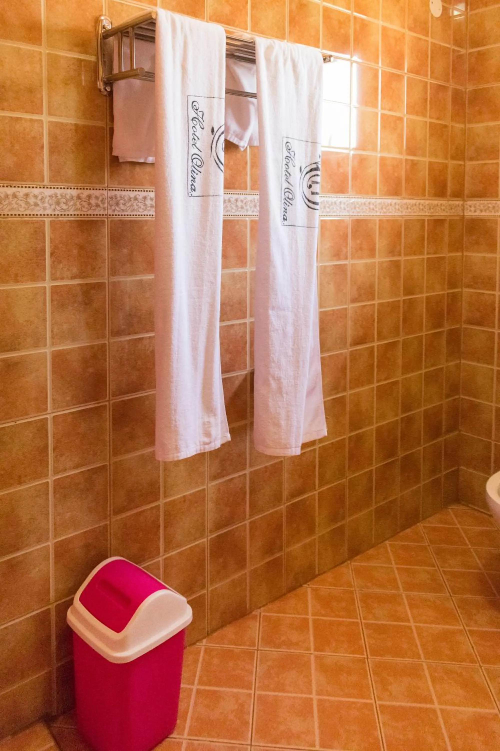 Bathroom in Olina Hotel and Apartments Kampala