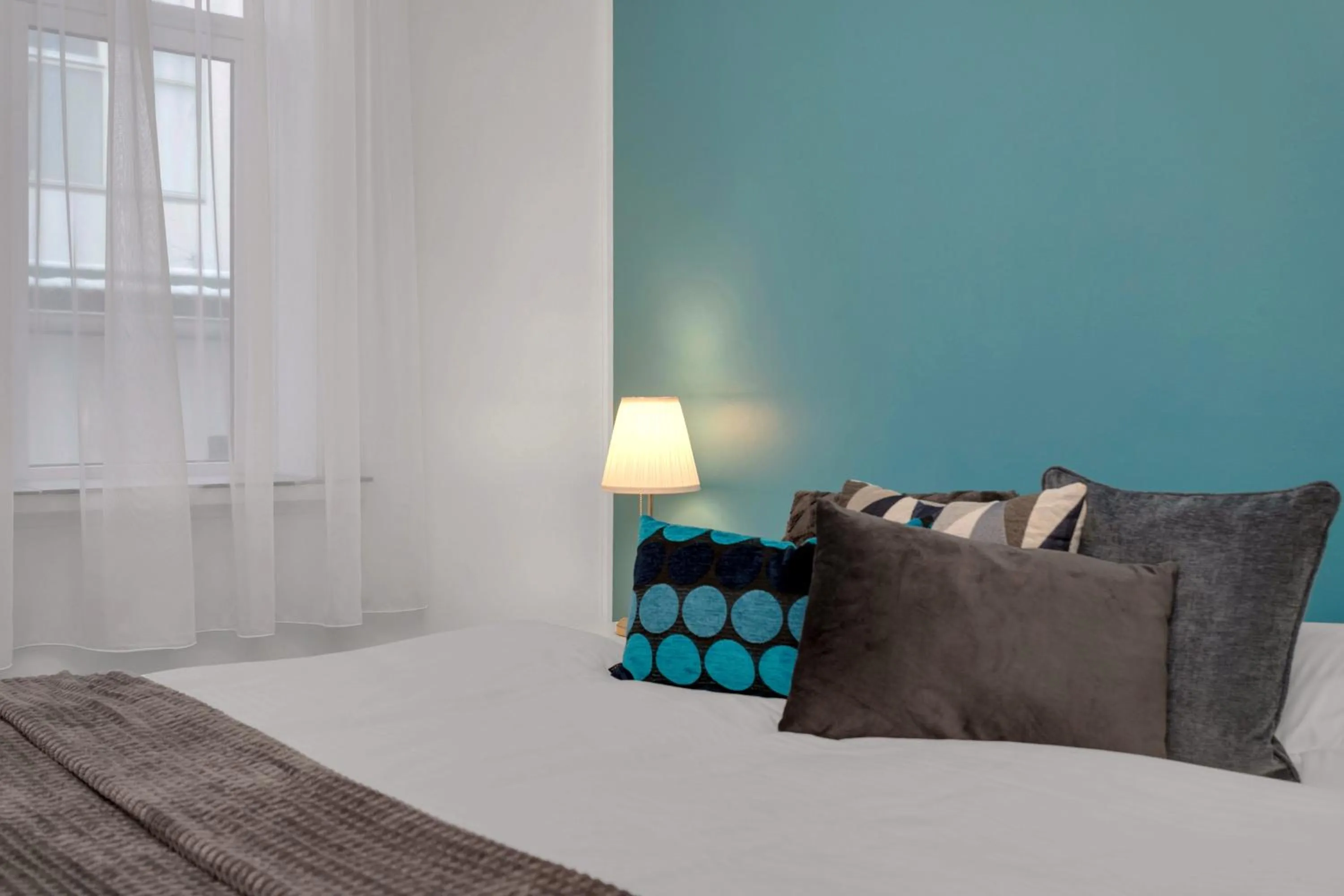 Bed in Castle House Luxury Apartments