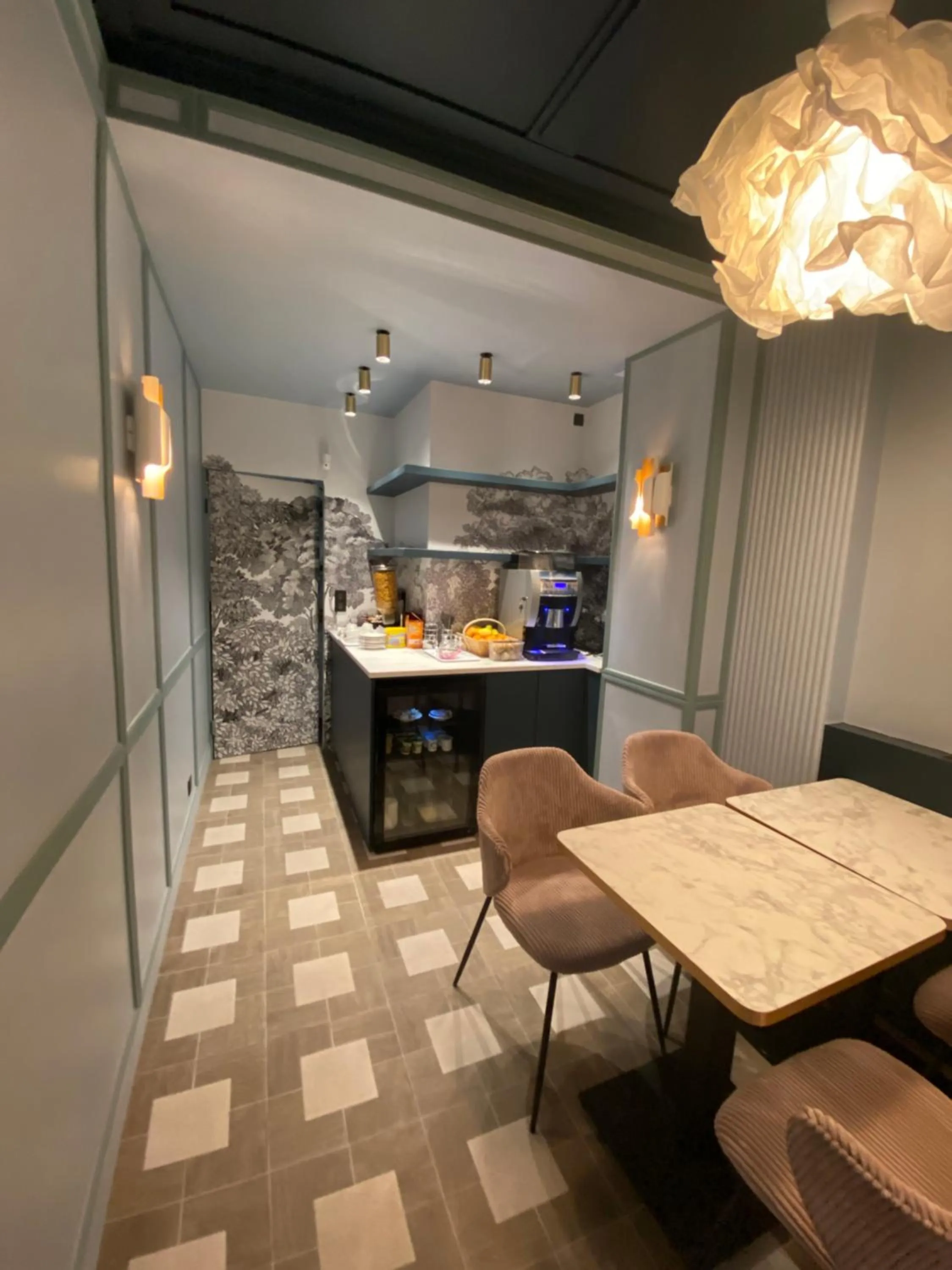 Communal lounge/ TV room in Amadeus Hotel