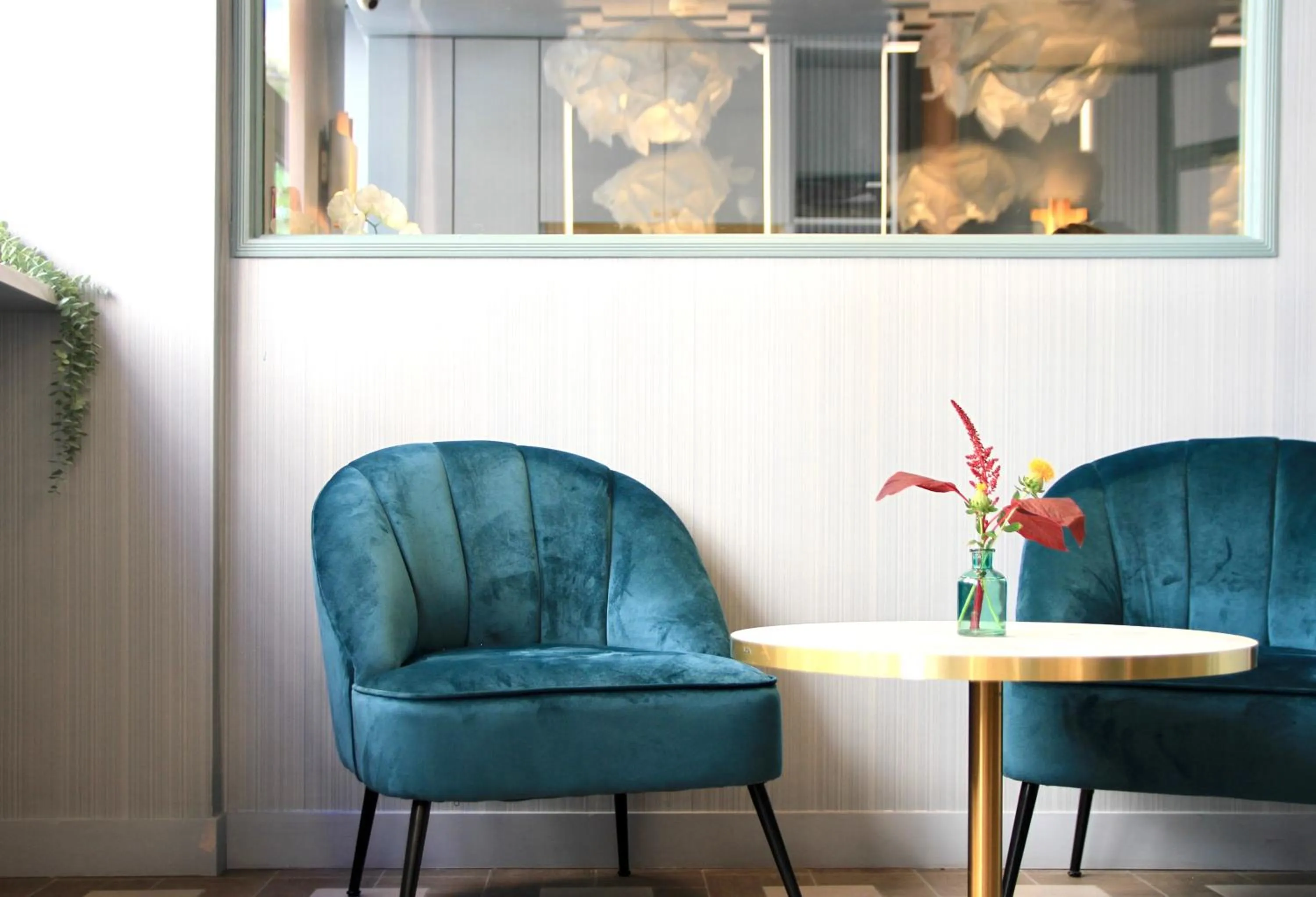 Communal lounge/ TV room in Amadeus Hotel