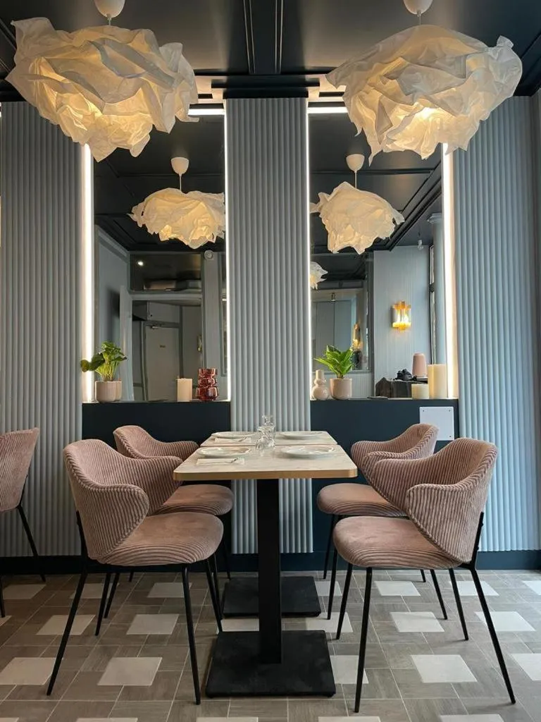 Communal lounge/ TV room in Amadeus Hotel