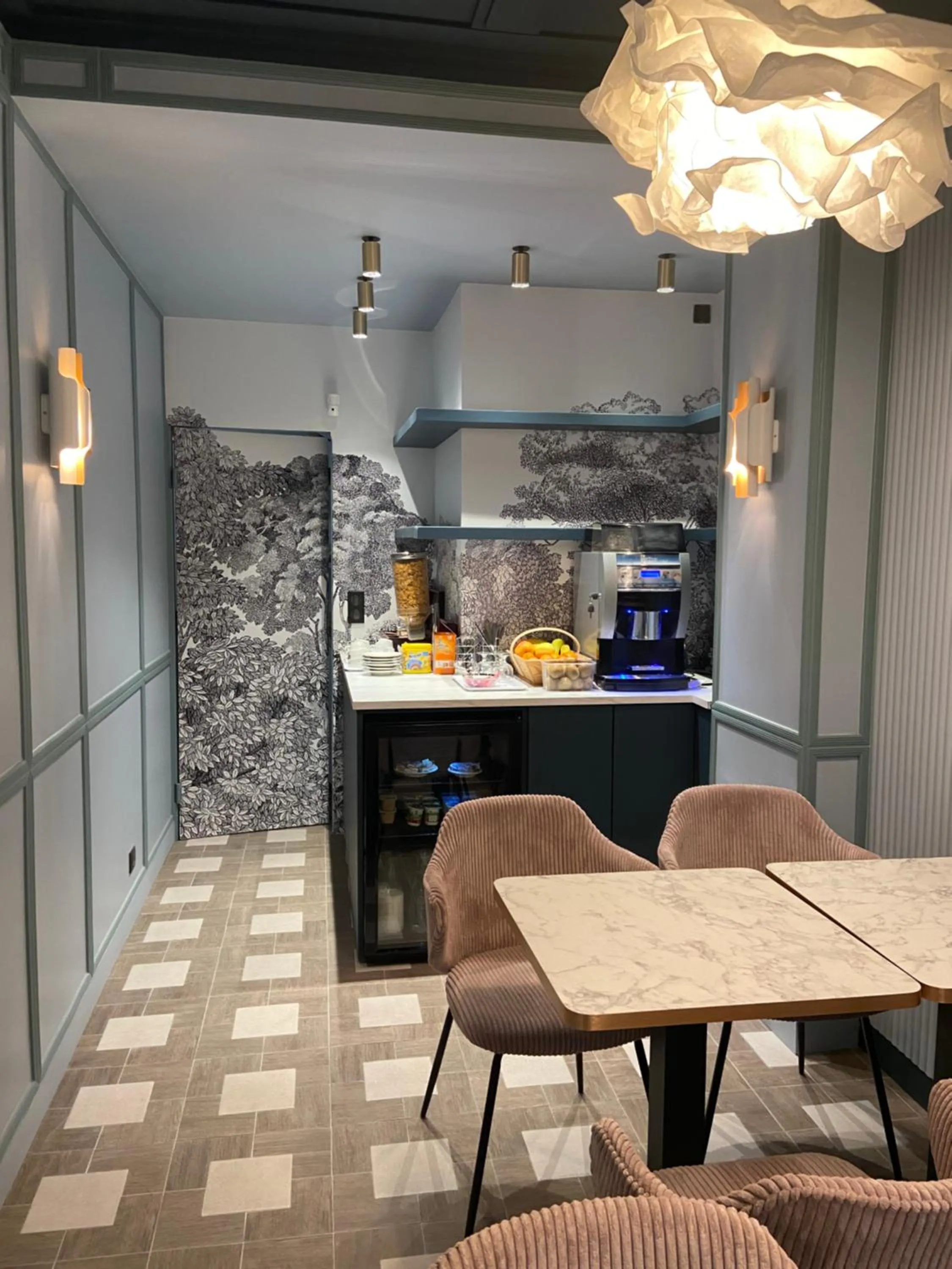 Communal lounge/ TV room in Amadeus Hotel