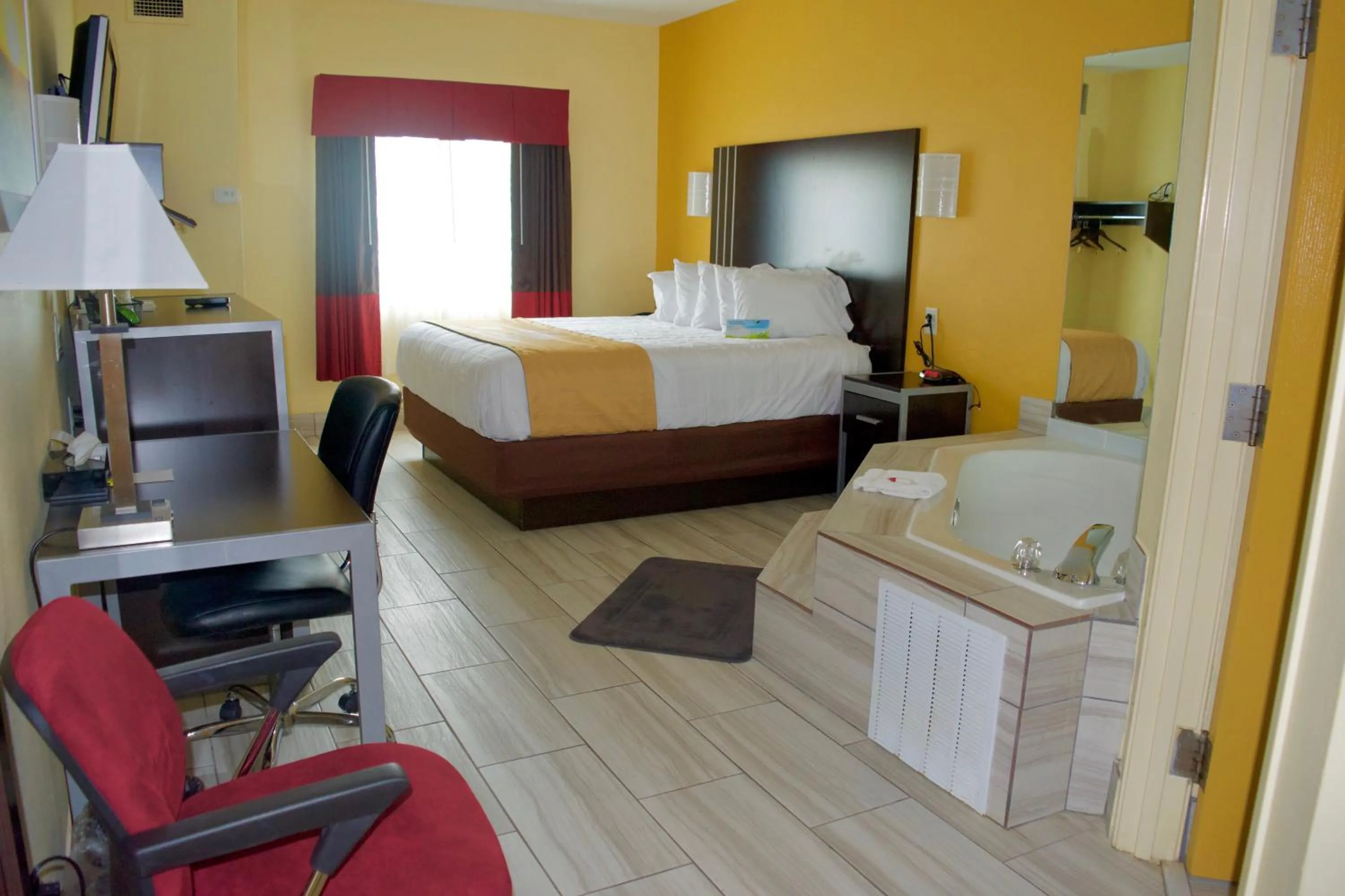 Photo of the whole room, Bed in Days Inn & Suites by Wyndham Augusta Near Fort Eisenhower