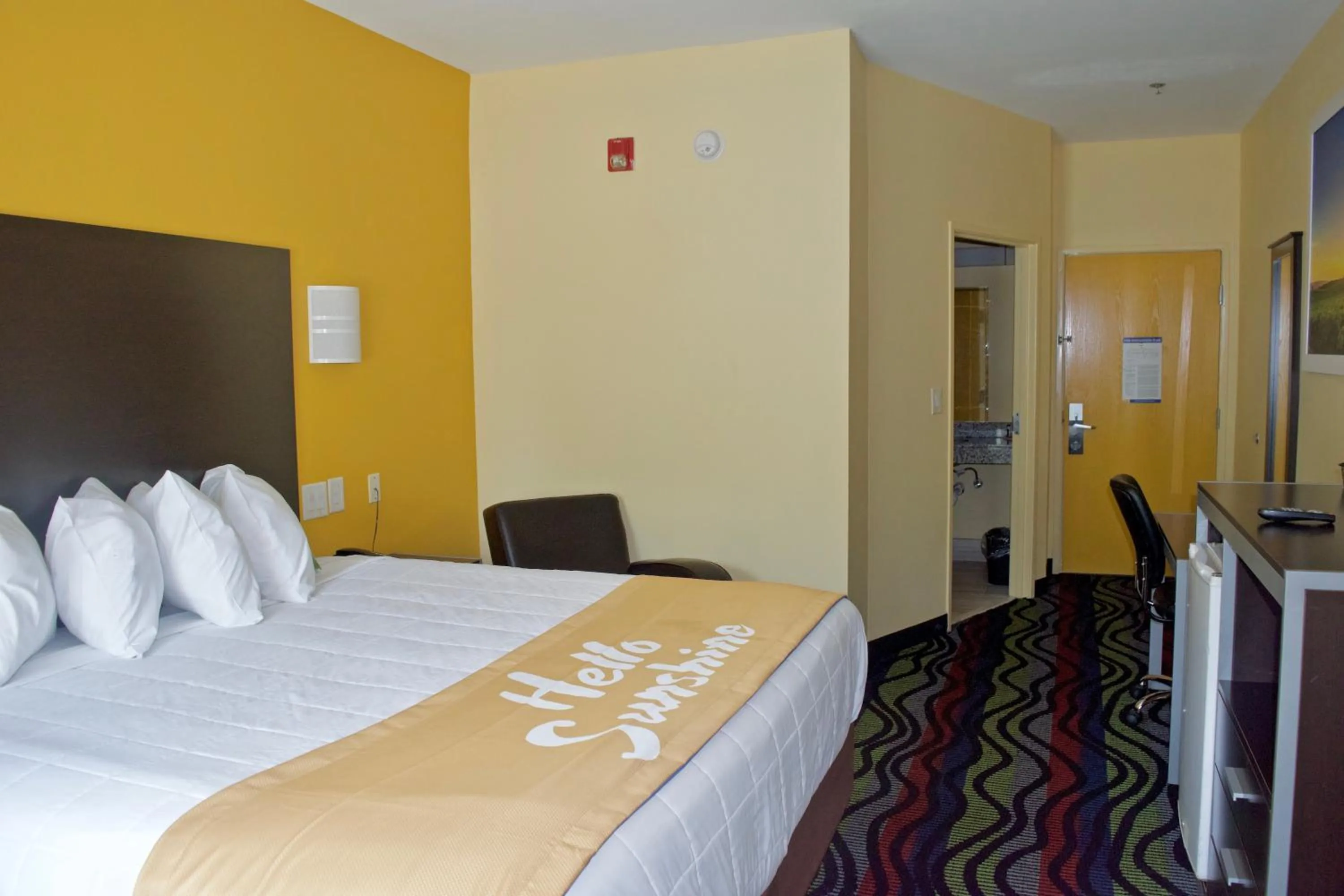 Photo of the whole room, Bed in Days Inn & Suites by Wyndham Augusta Near Fort Eisenhower