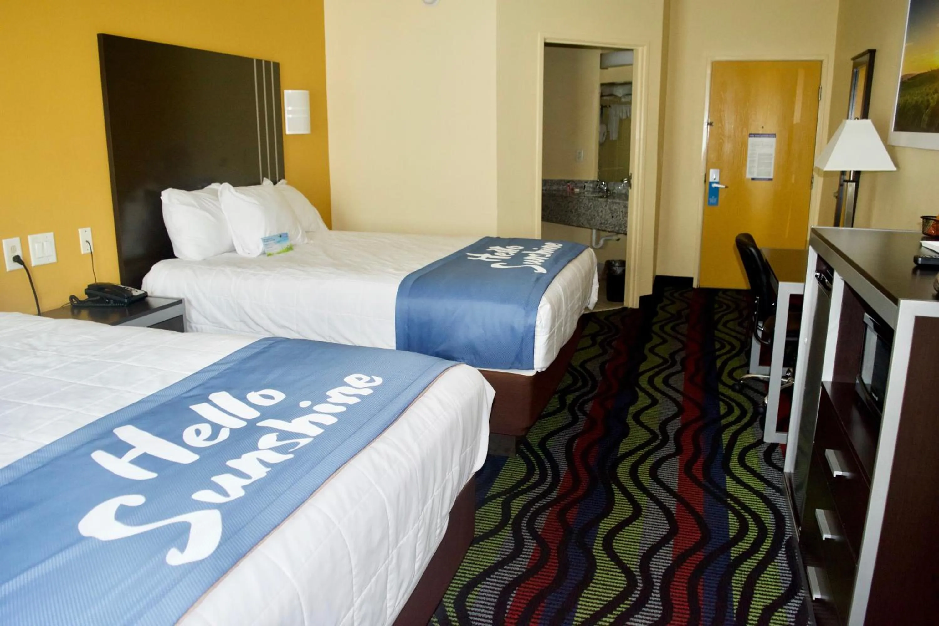 Photo of the whole room, Bed in Days Inn & Suites by Wyndham Augusta Near Fort Eisenhower