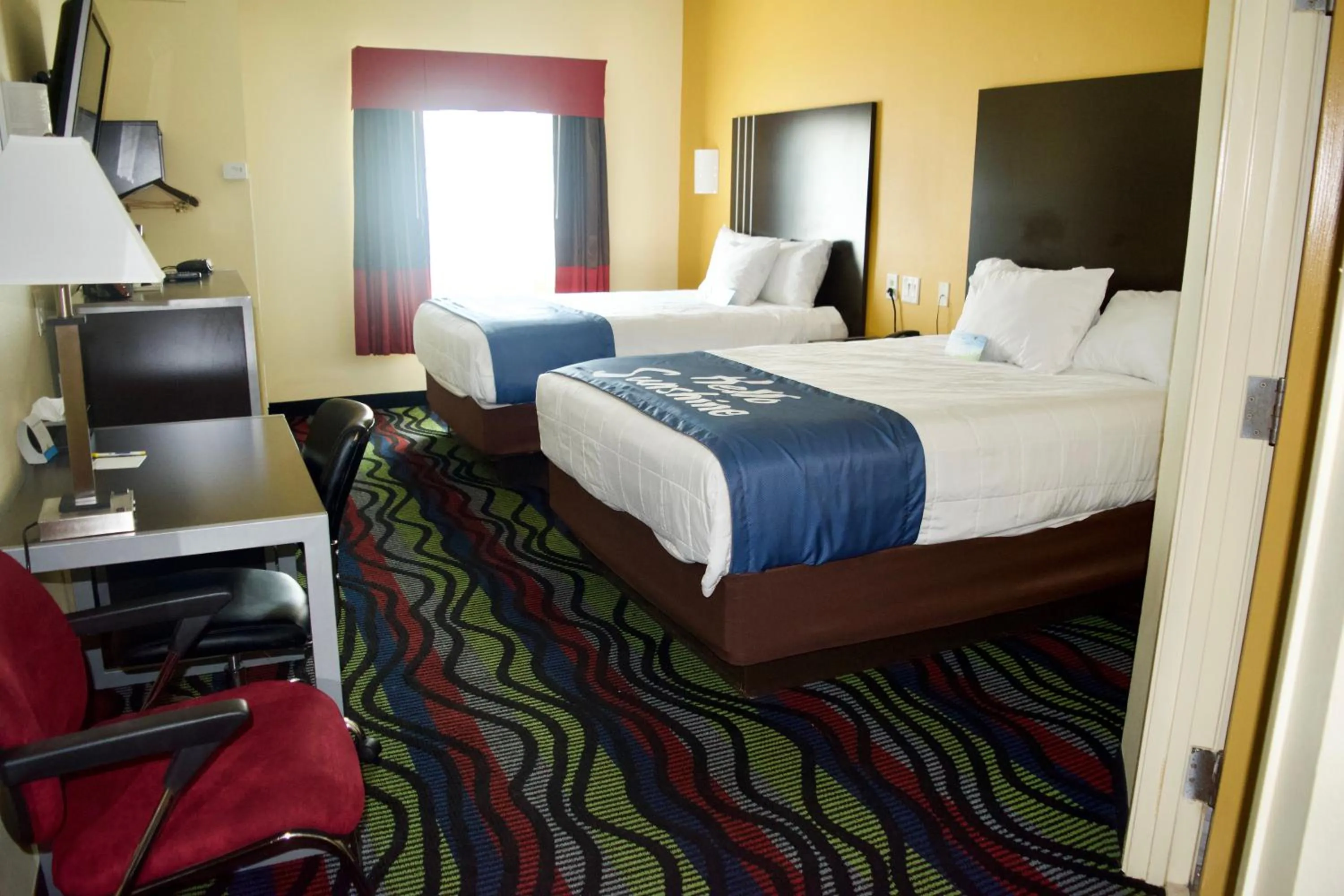 Photo of the whole room, Bed in Days Inn & Suites by Wyndham Augusta Near Fort Eisenhower