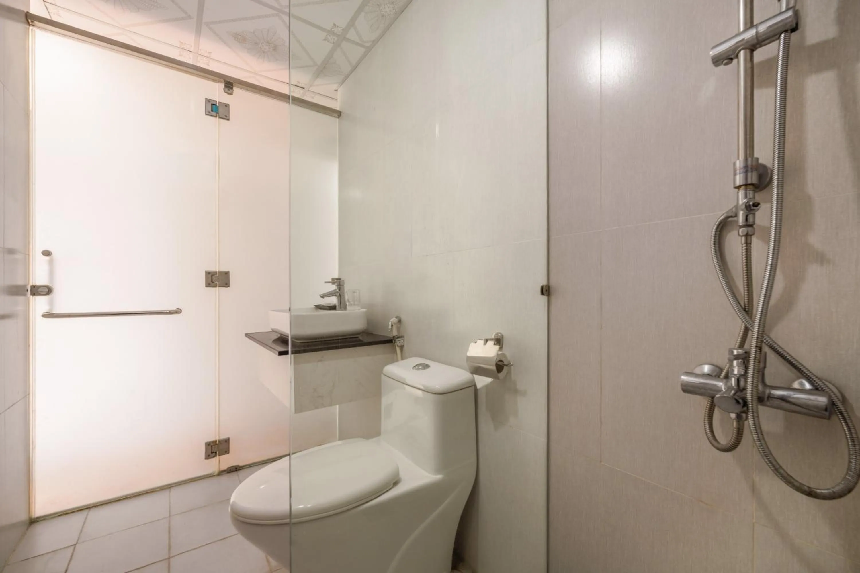 Bathroom in Maxhome Luxury Hotel