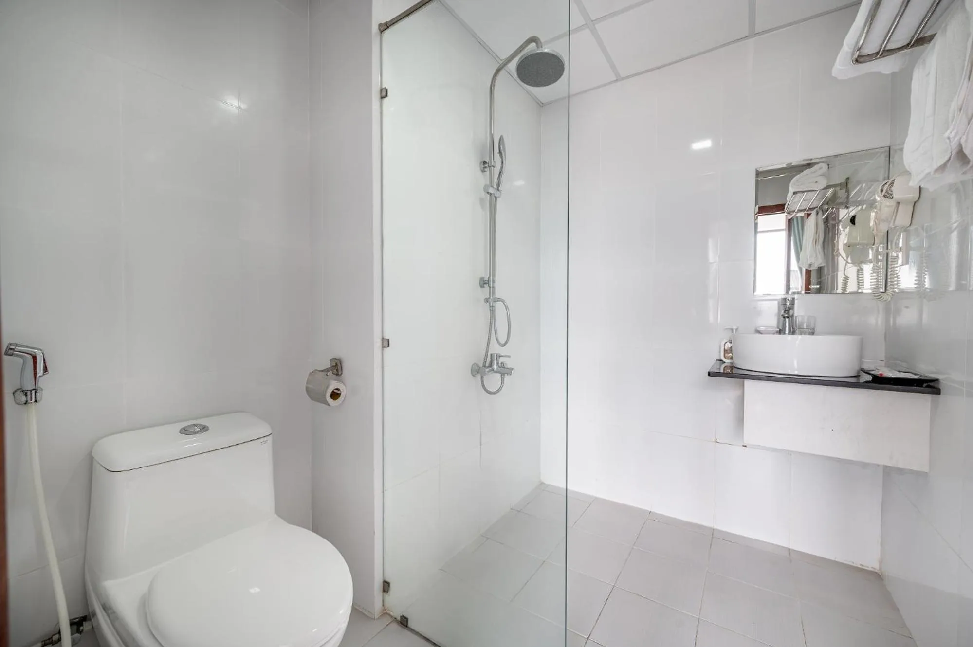 Bathroom in Maxhome Luxury Hotel