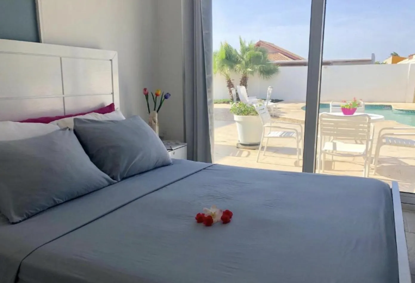 Photo of the whole room, Bed in Genesis Apartments