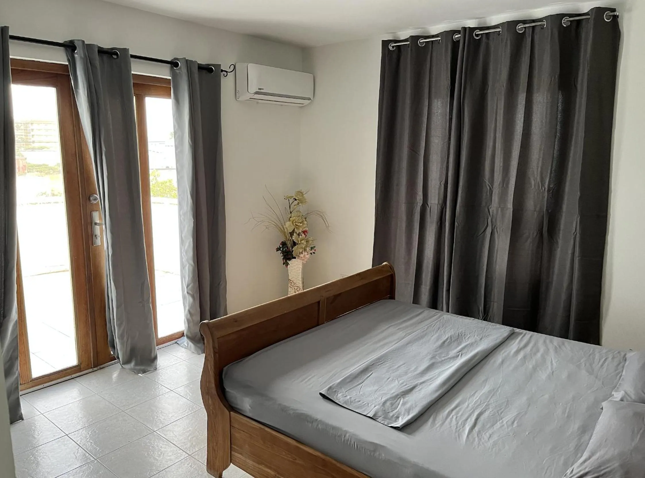 Bed in Genesis Apartments