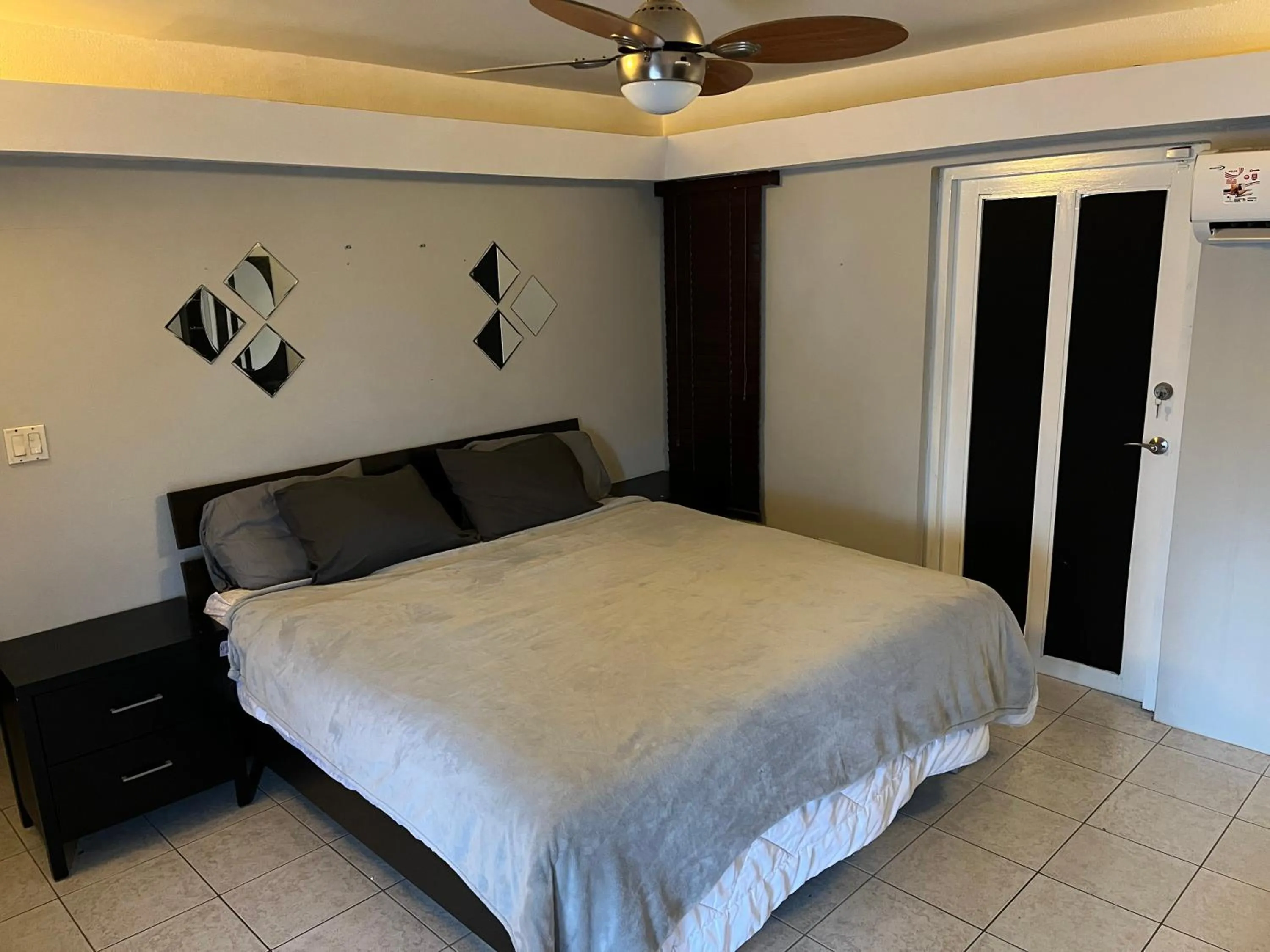 Bed in Genesis Apartments