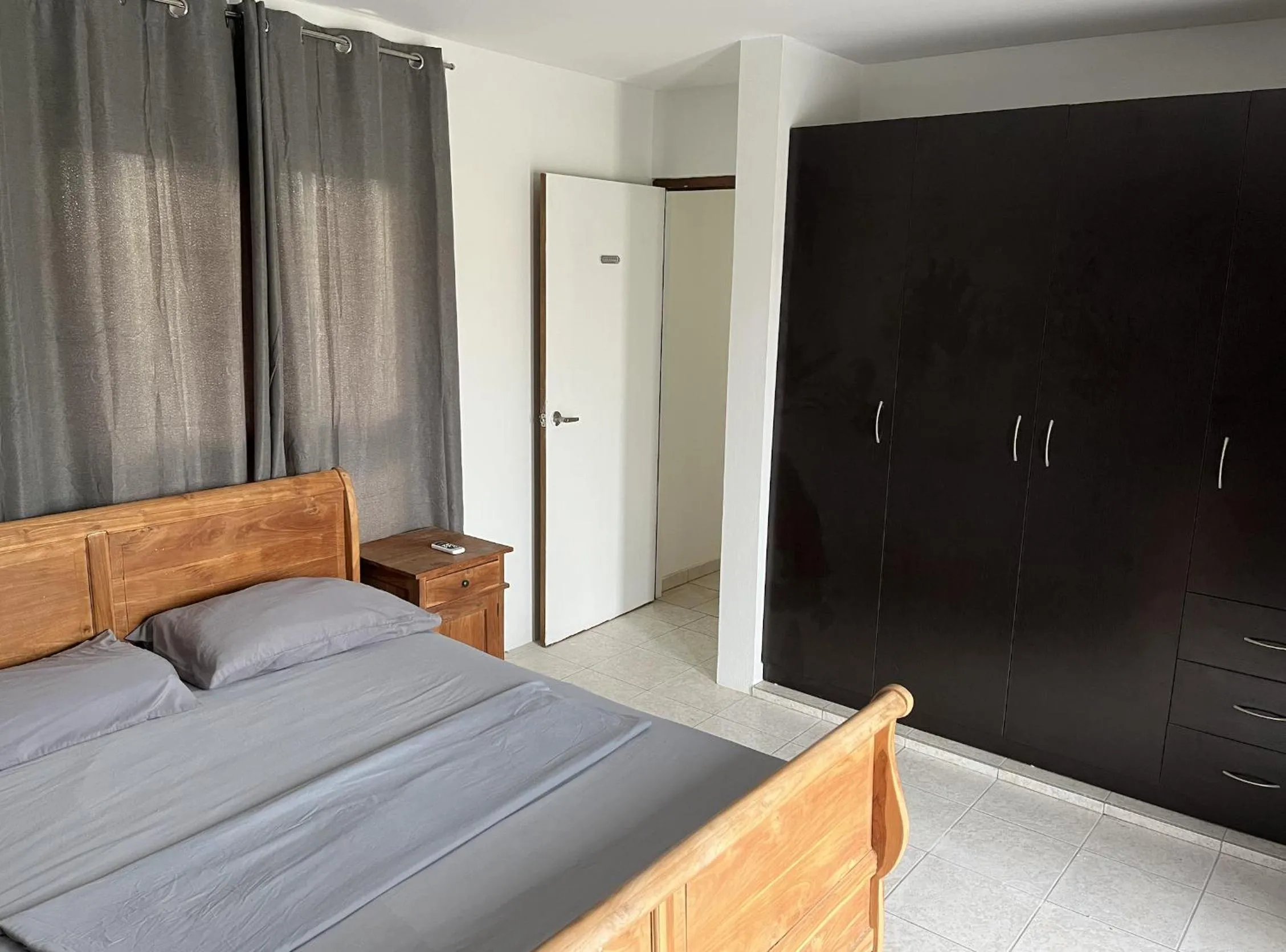 Bed in Genesis Apartments