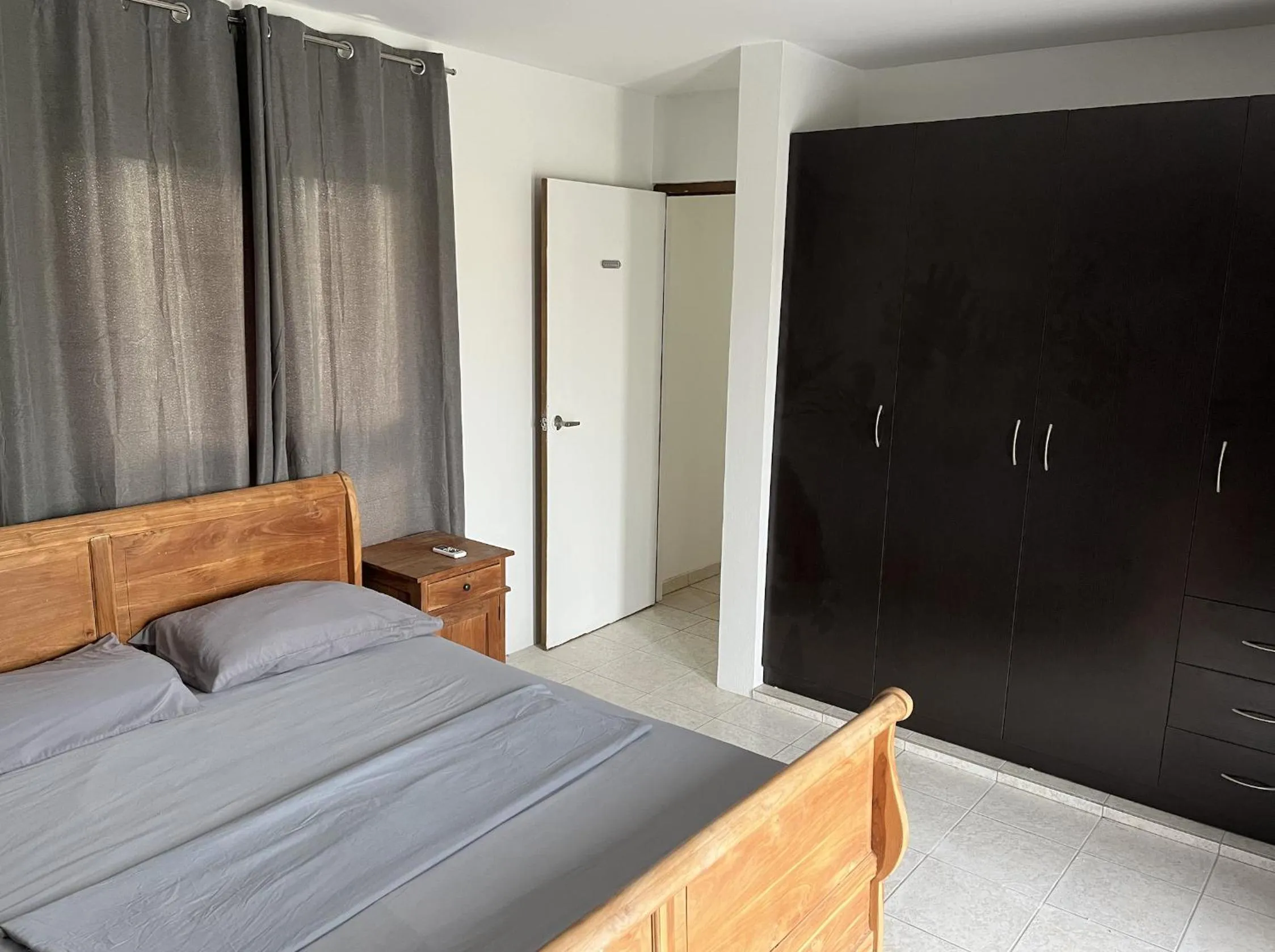 Bed in Genesis Apartments