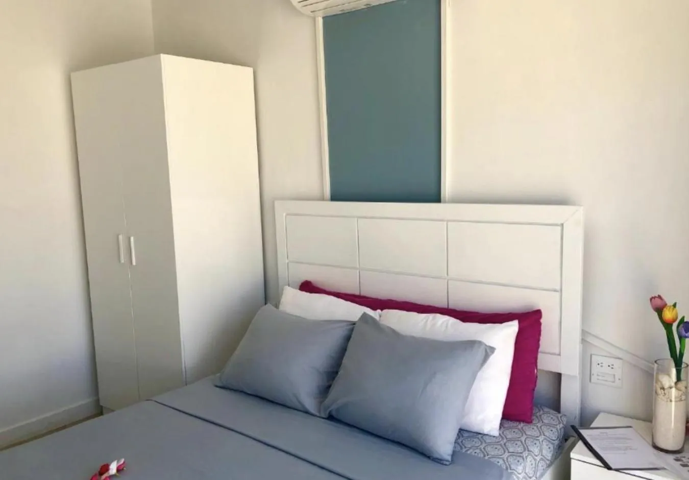 Bed in Genesis Apartments