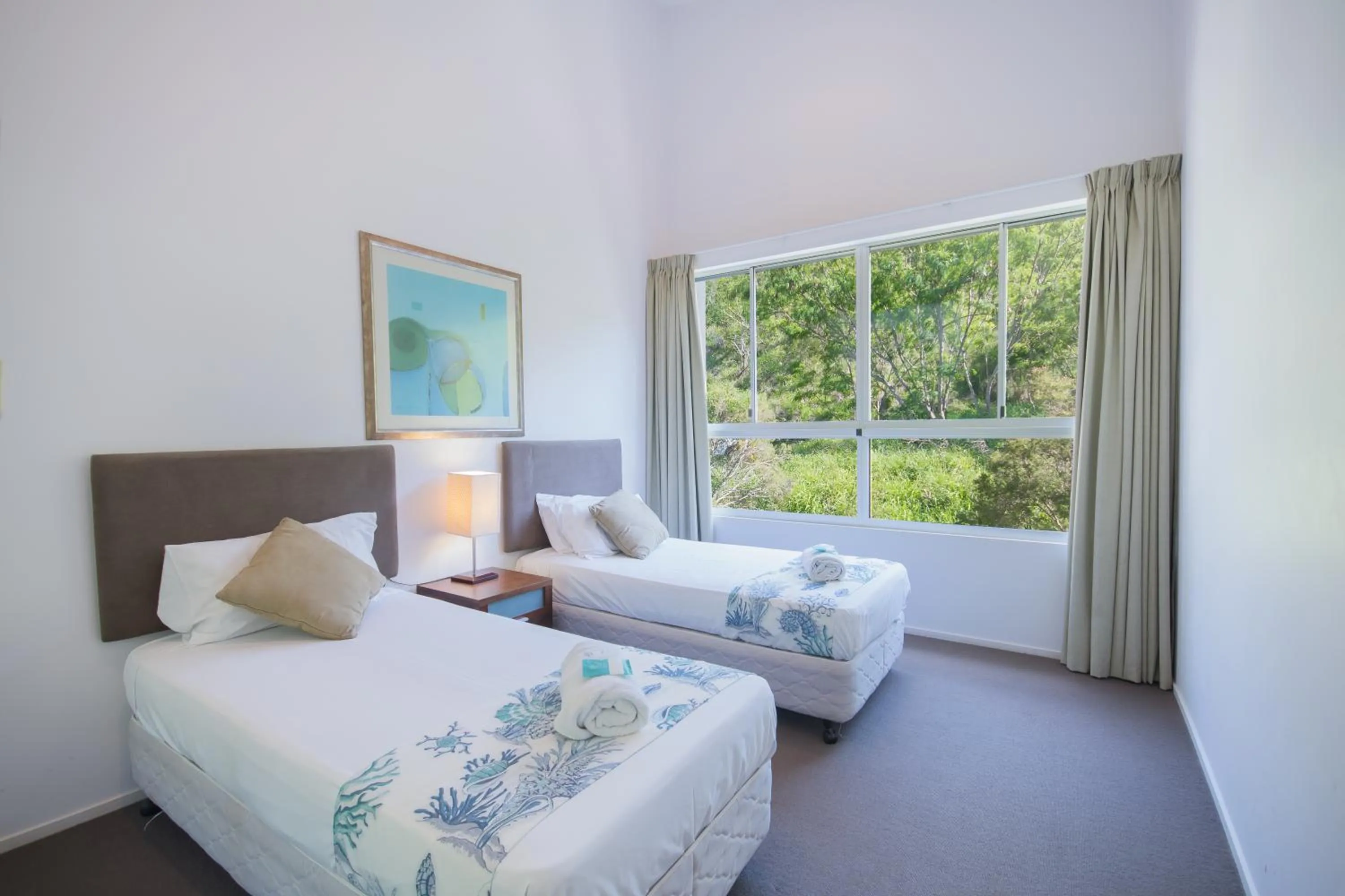 Bed in Azure Sea Whitsunday Resort