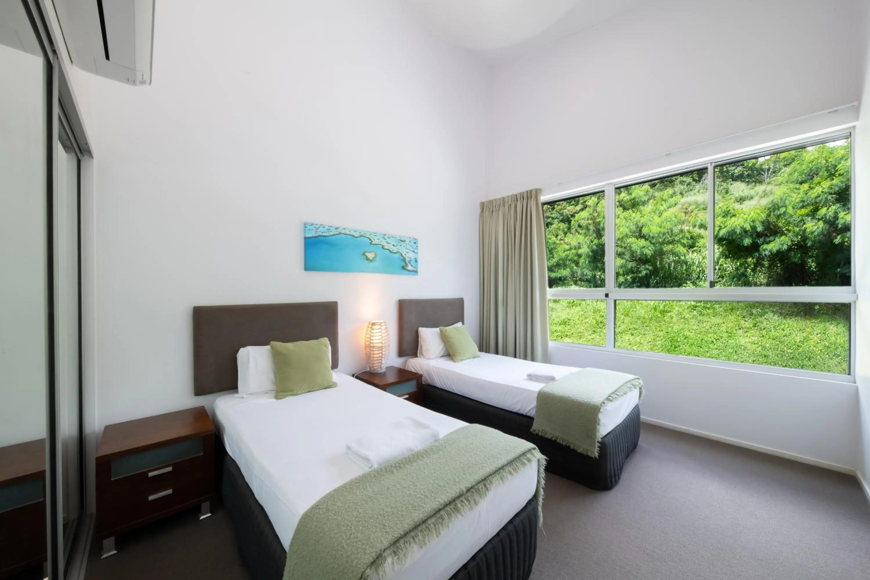 Bed in Azure Sea Whitsunday Resort