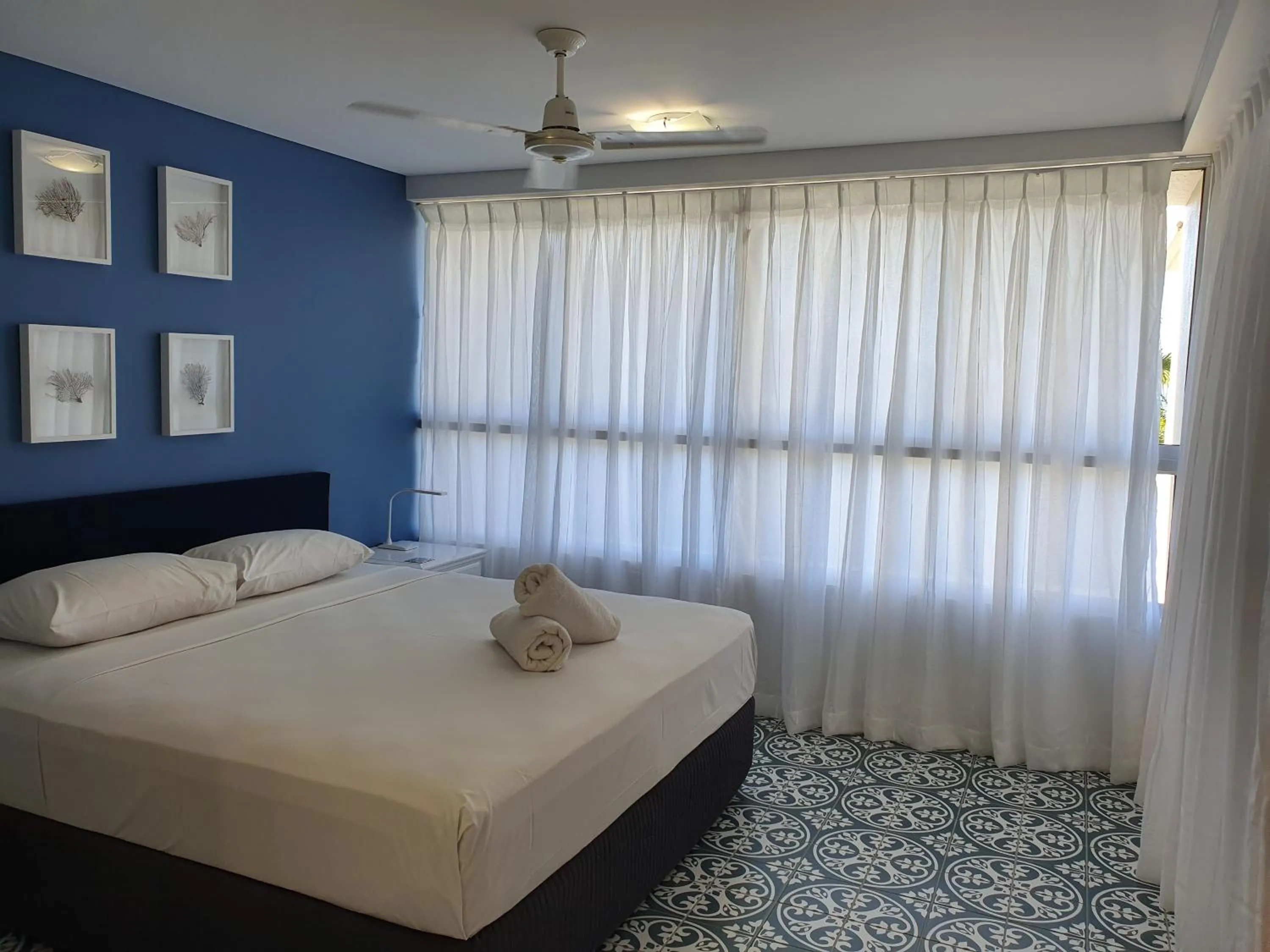 Bed in Azure Sea Whitsunday Resort