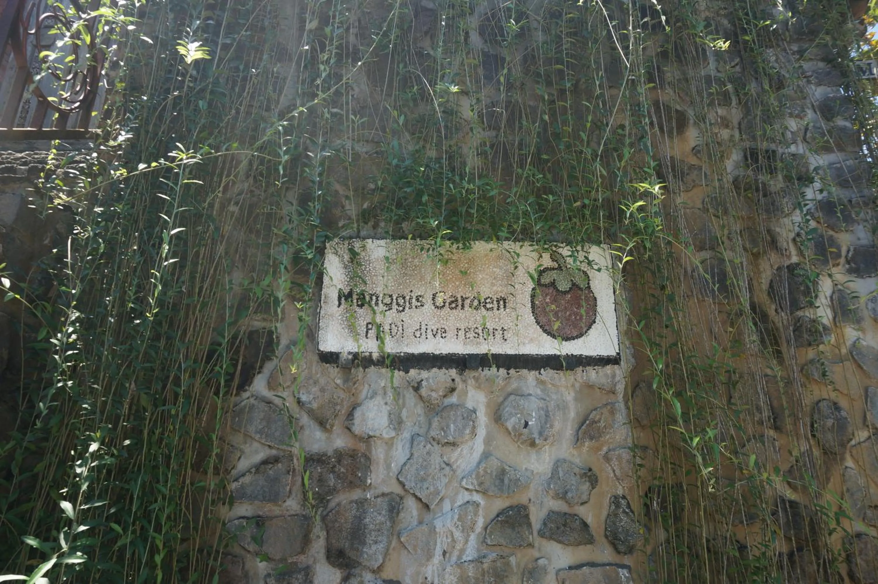 Property logo or sign in Manggis Garden Dive Resort