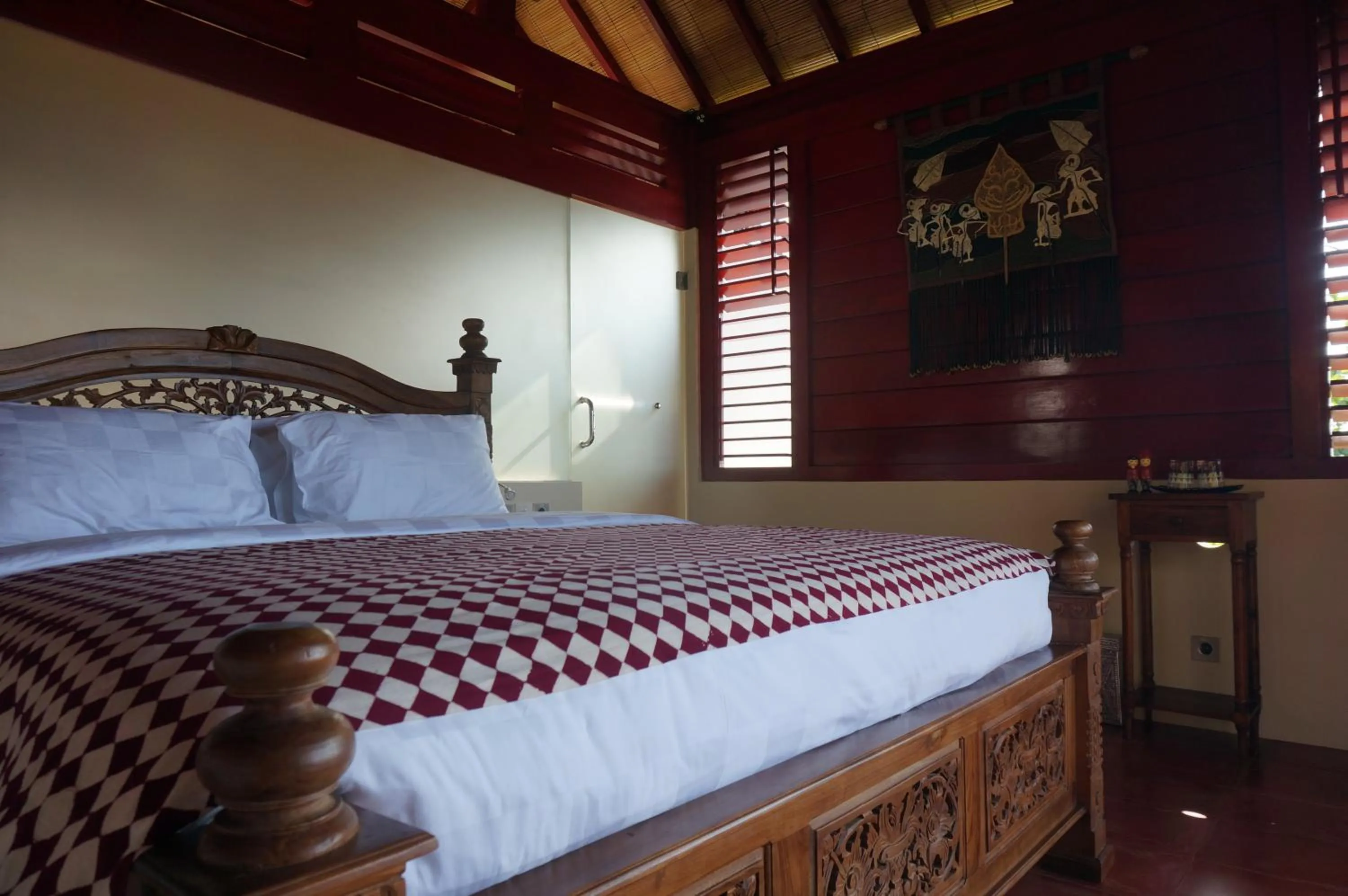 Bed in Manggis Garden Dive Resort