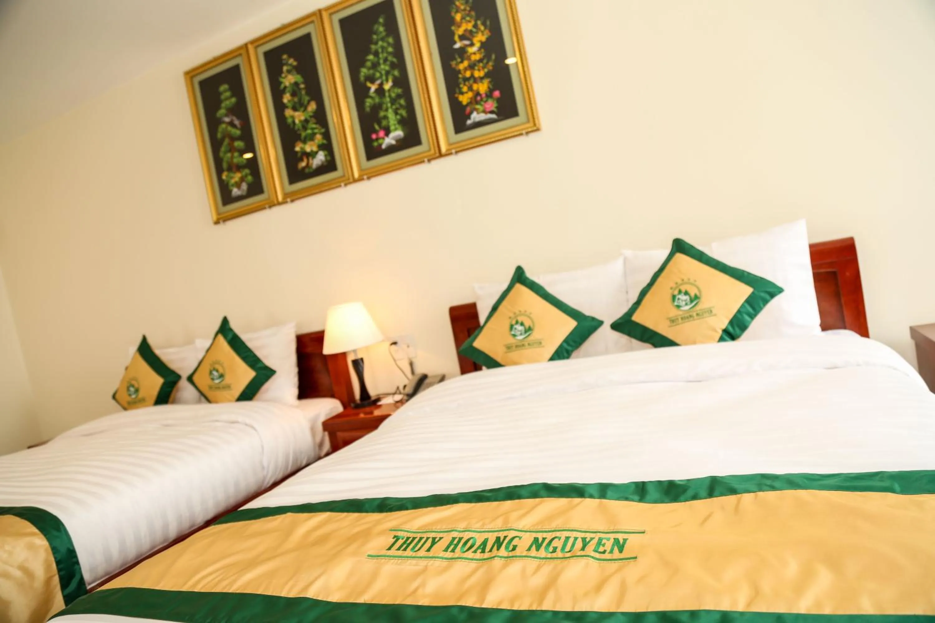 Bed in Thuy Hoang Nguyen Resort & Spa