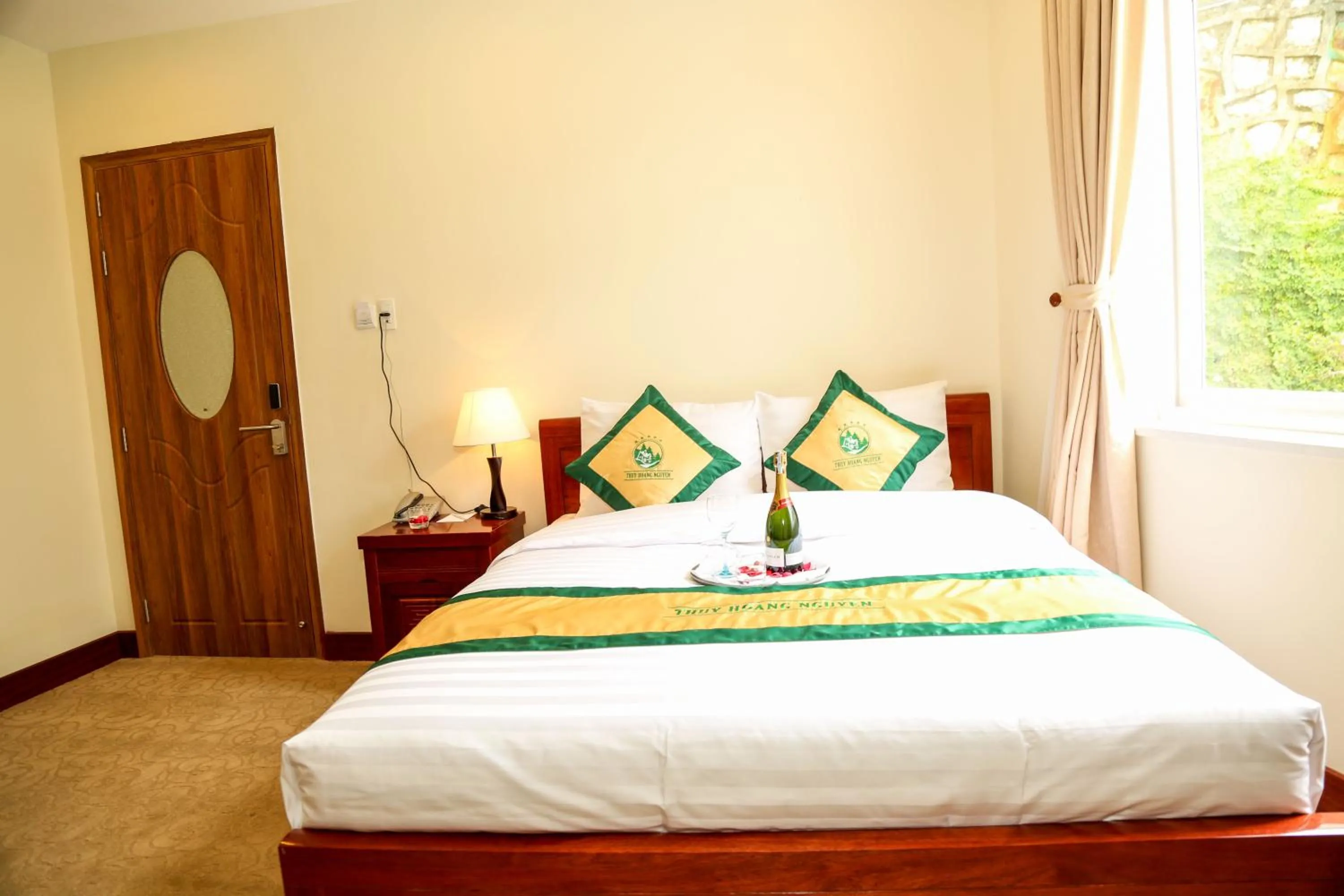 Bed in Thuy Hoang Nguyen Resort & Spa