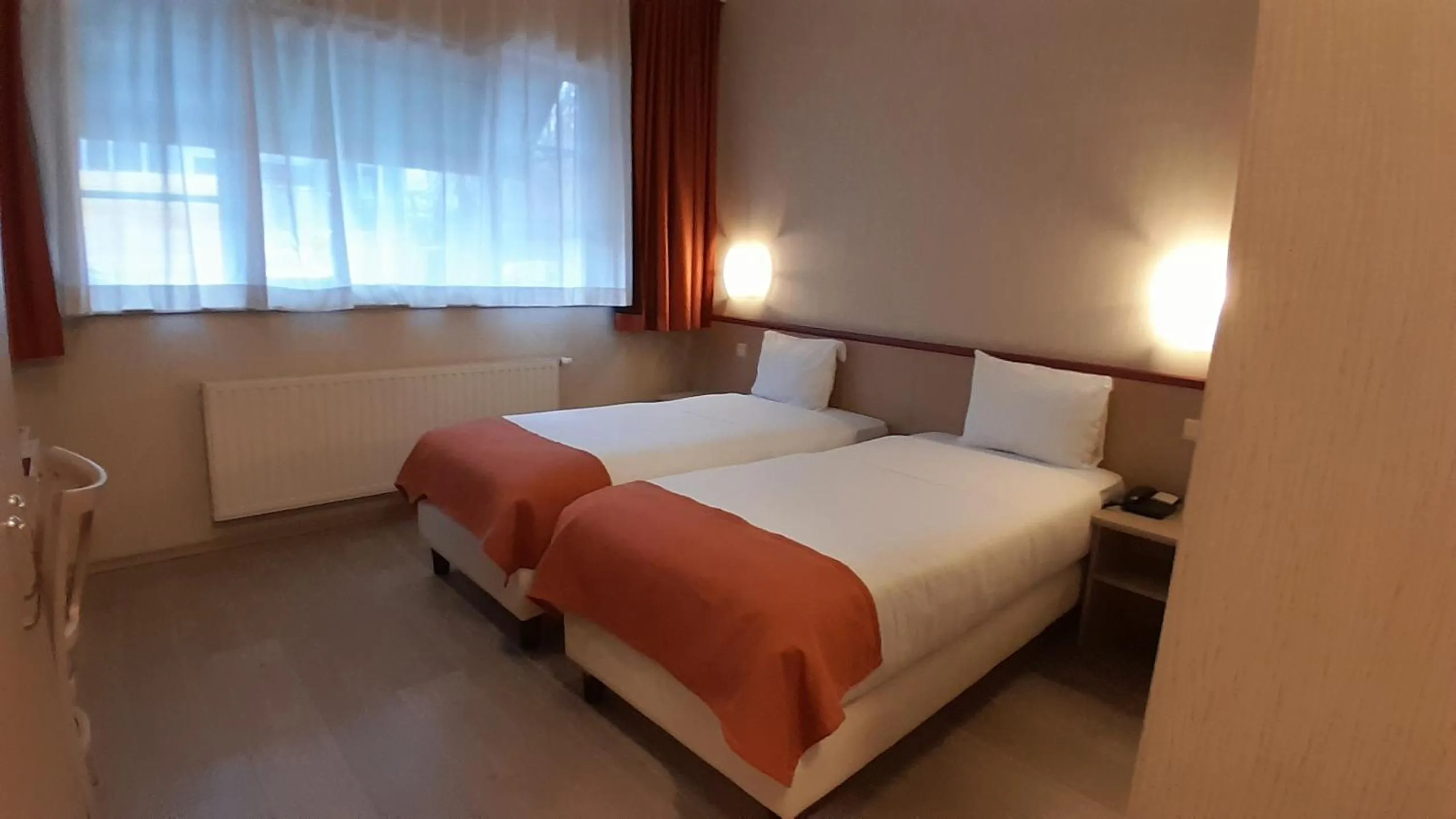 Bed in Hotel Taormina Brussels Airport