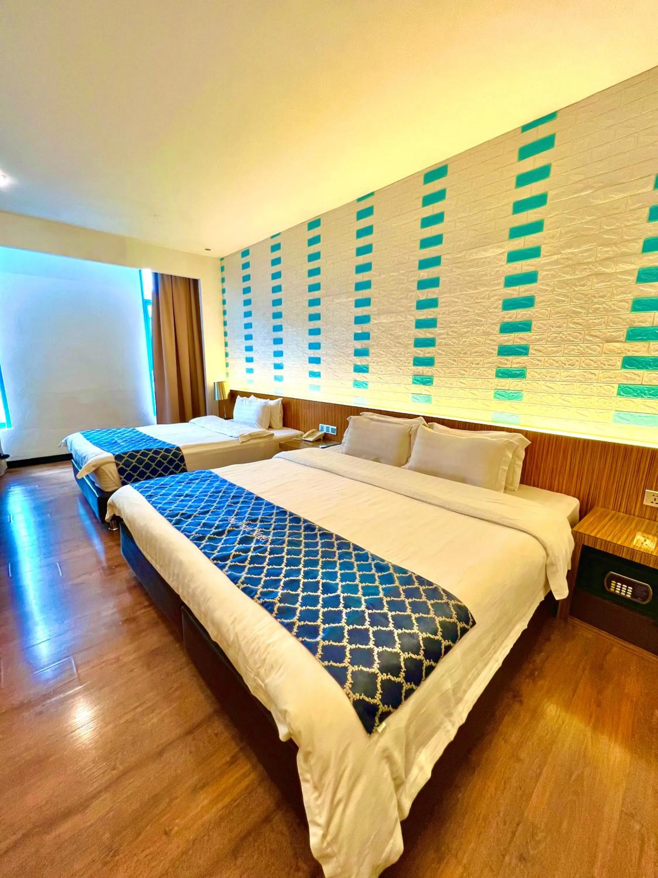 Bed in New World Express Motel