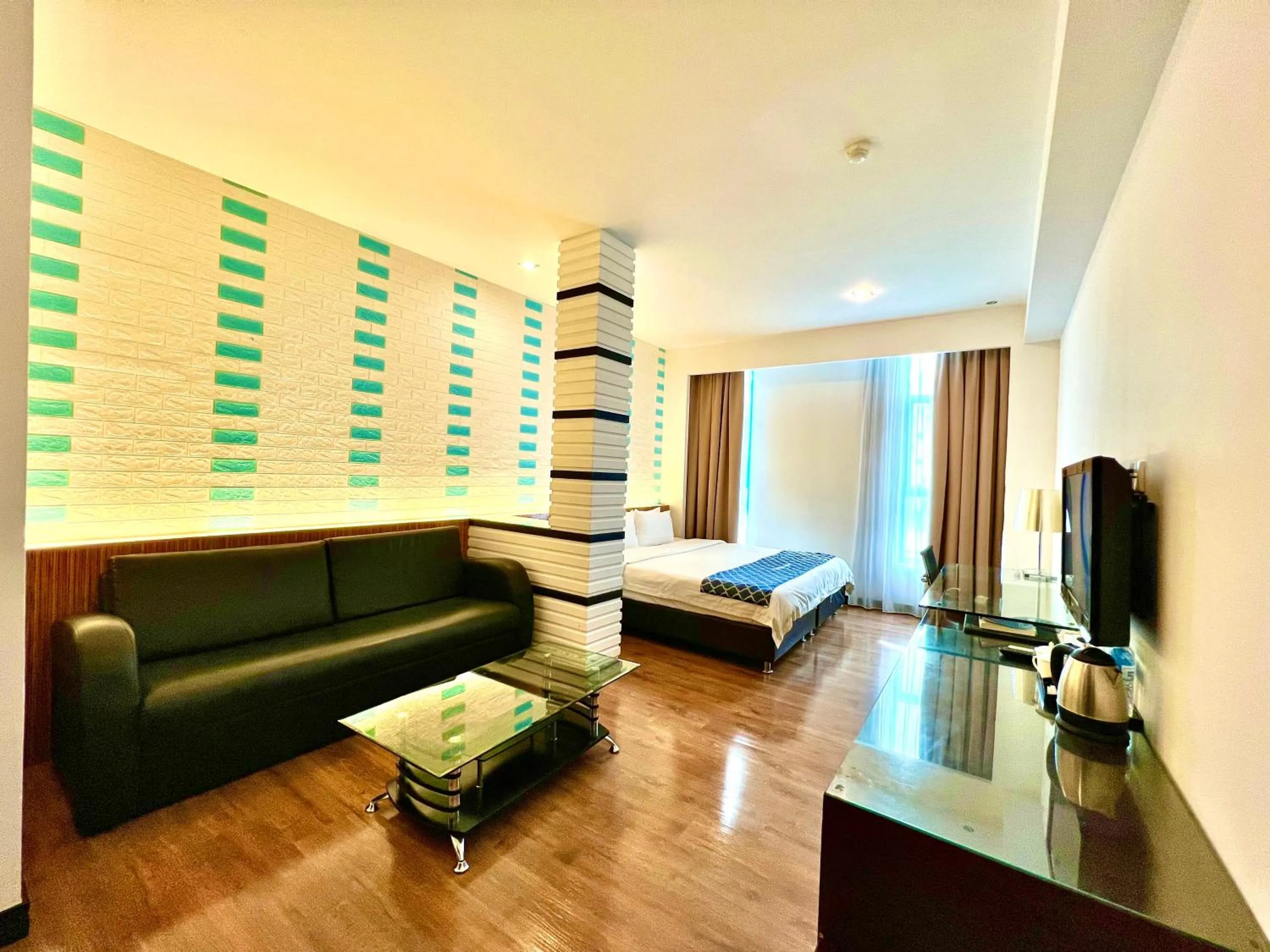 Photo of the whole room in New World Express Motel