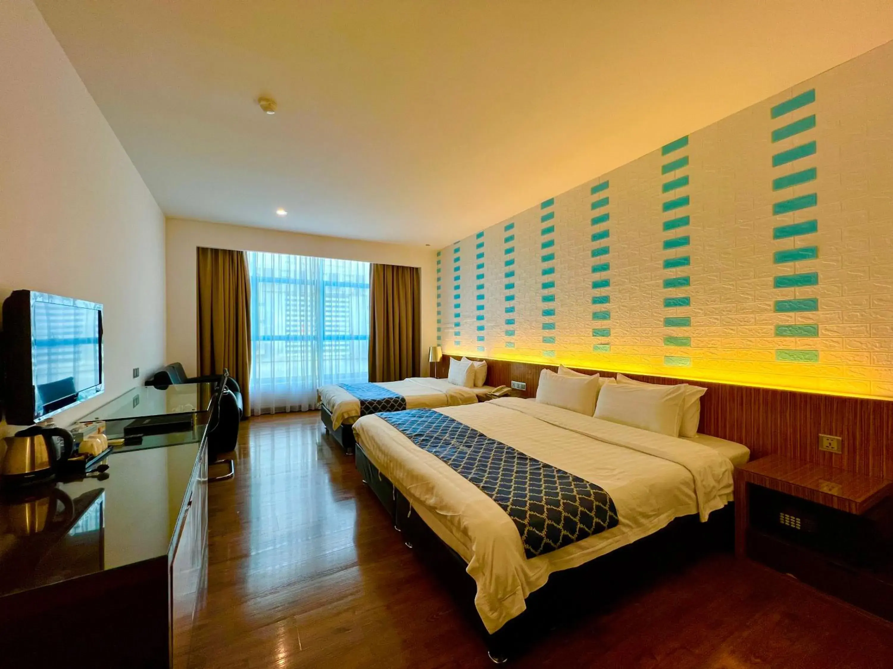 Deluxe Triple Room in New World Express Motel Deluxe Triple Room in New World Express Motel