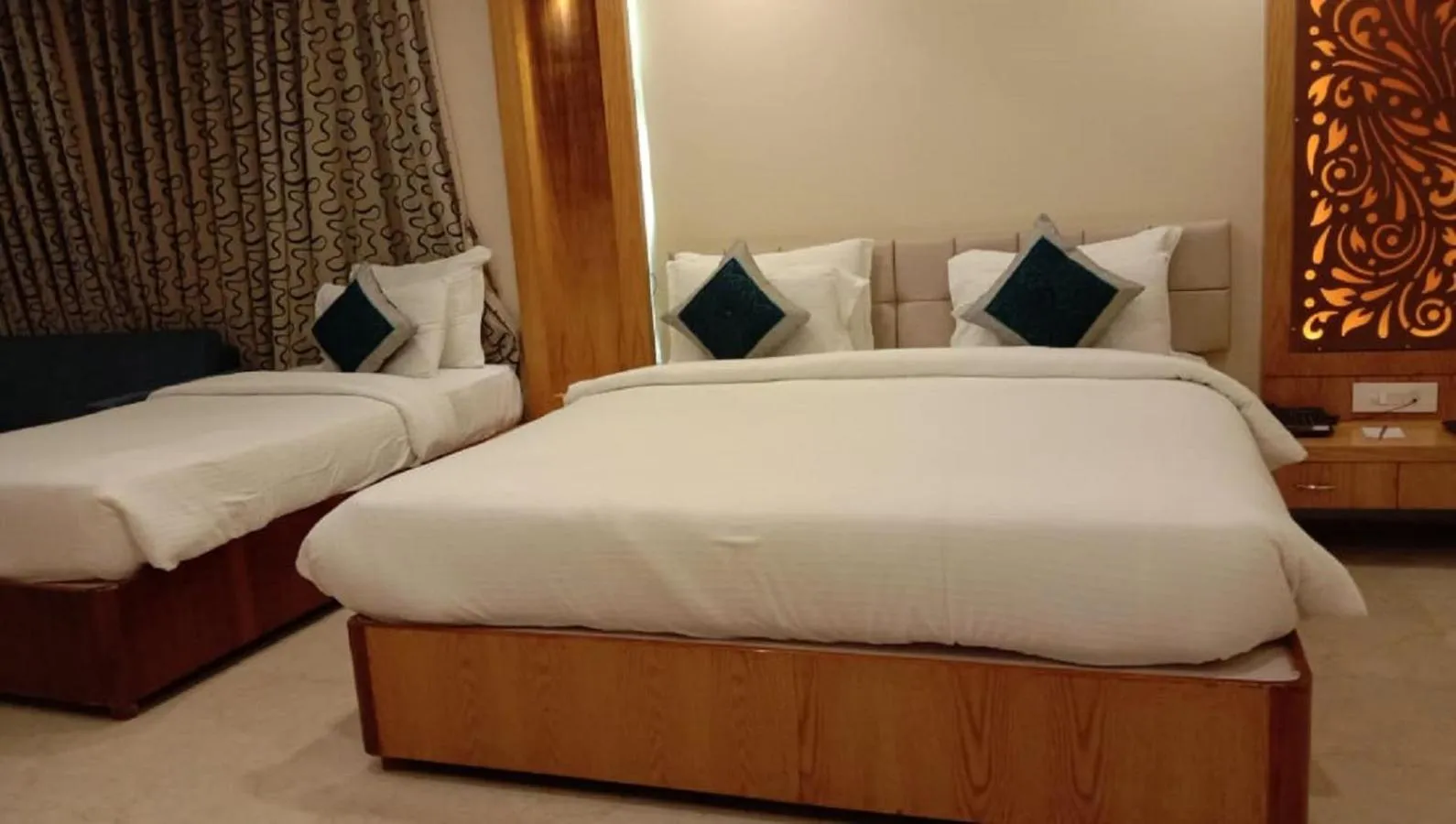 Bed in Hotel Tridev