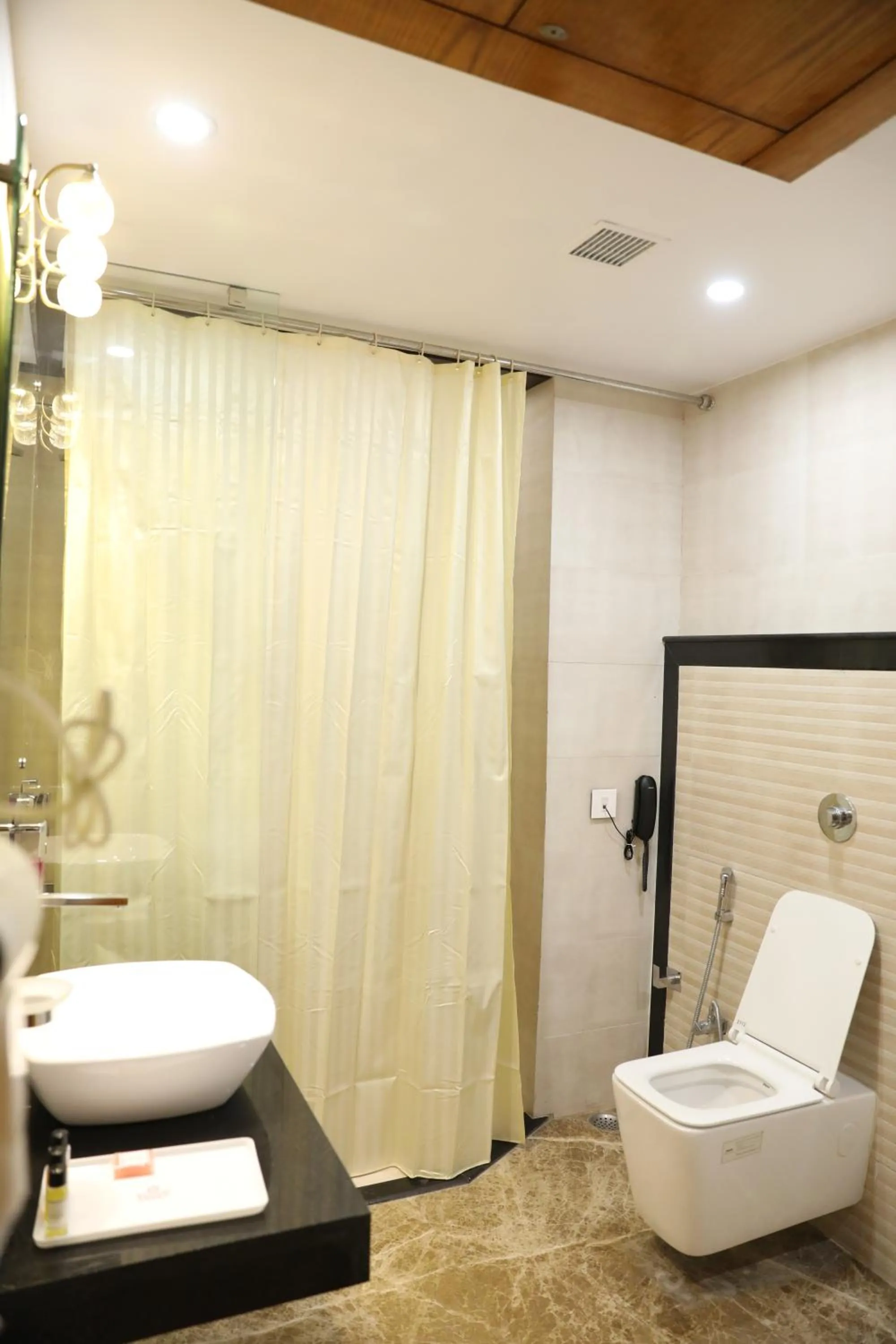 Bathroom in Hotel Tridev