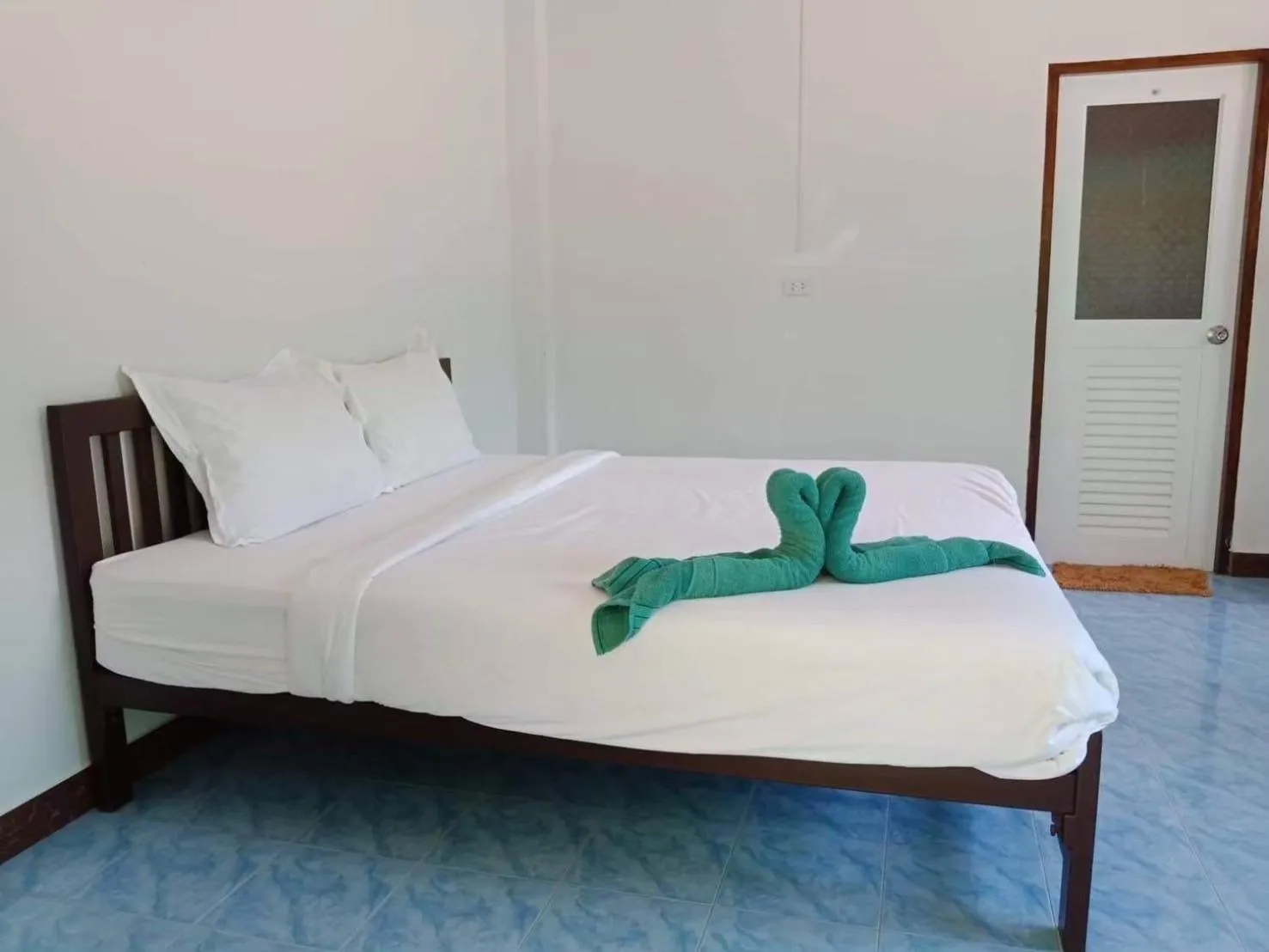 Bed in Nai C Resort