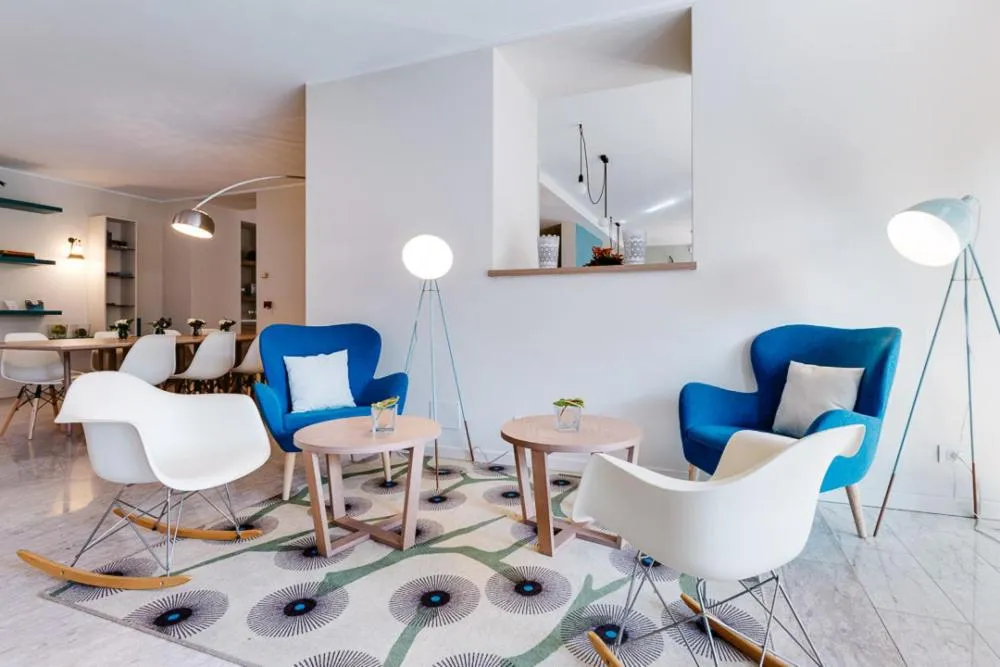 Communal lounge/ TV room in Hotel Al Sole Bardolino