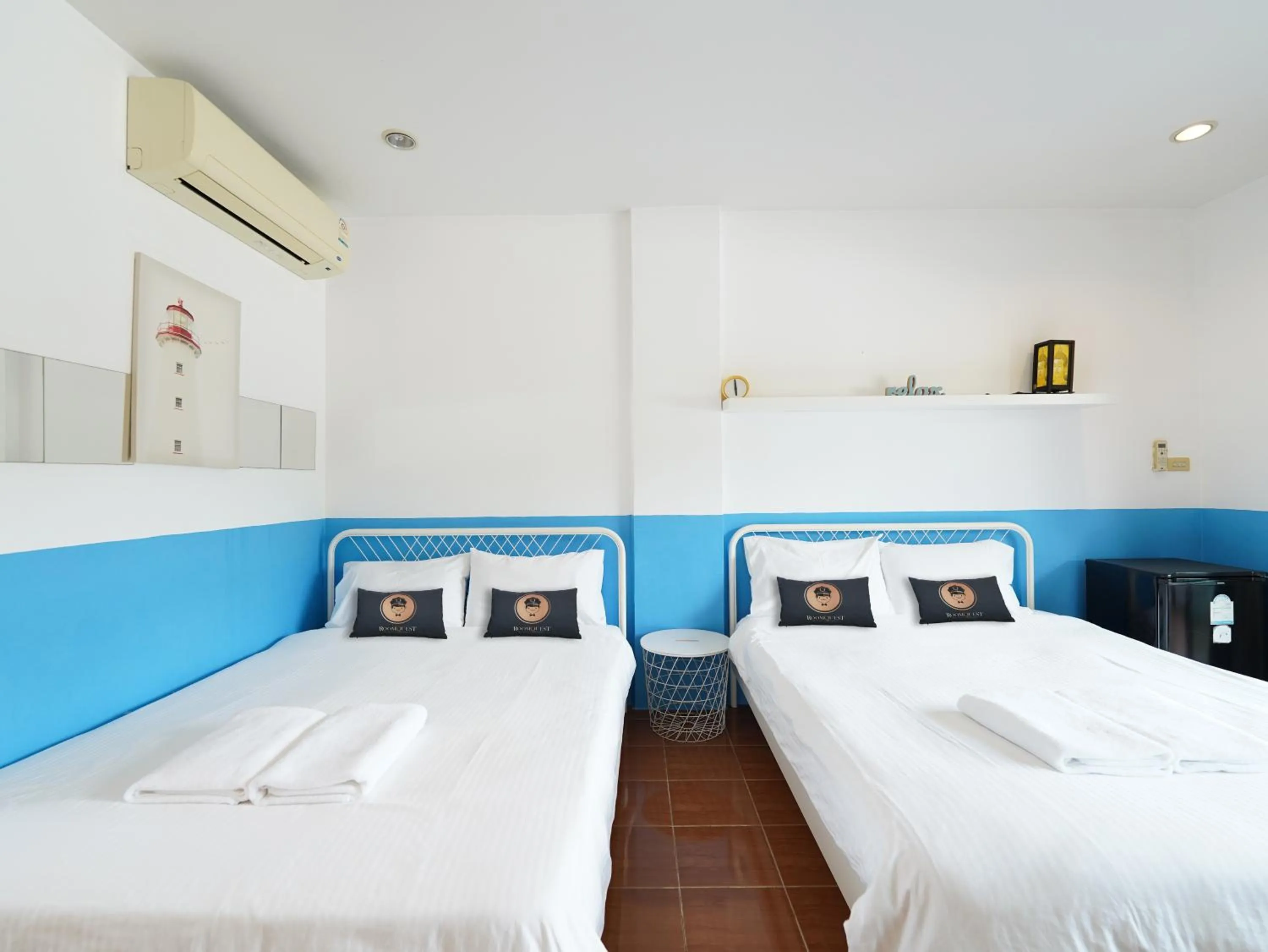 Bed in RoomQuest One Bangsaray