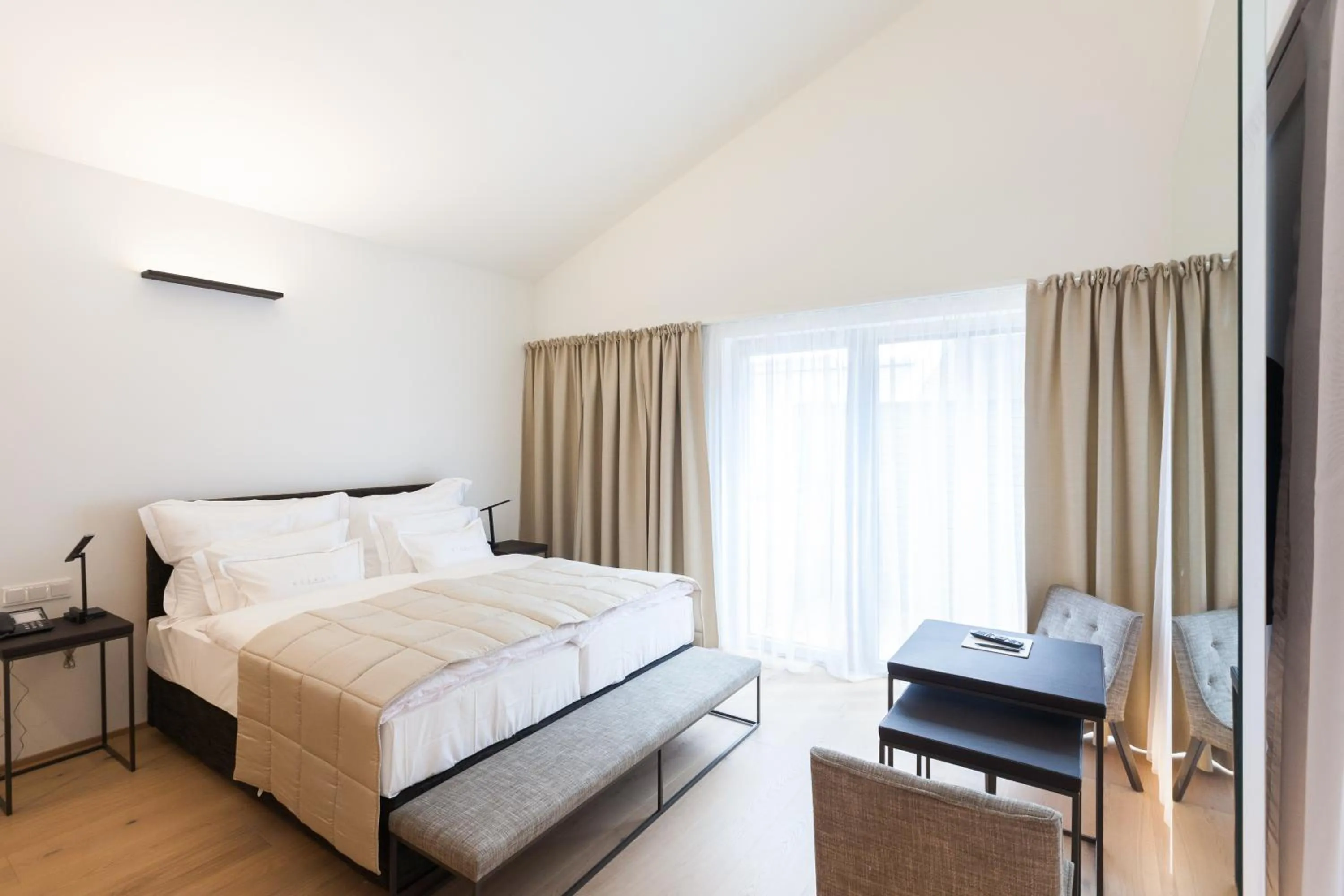 Bed in MÖRWALD Relais & Châteaux Hotel am Wagram