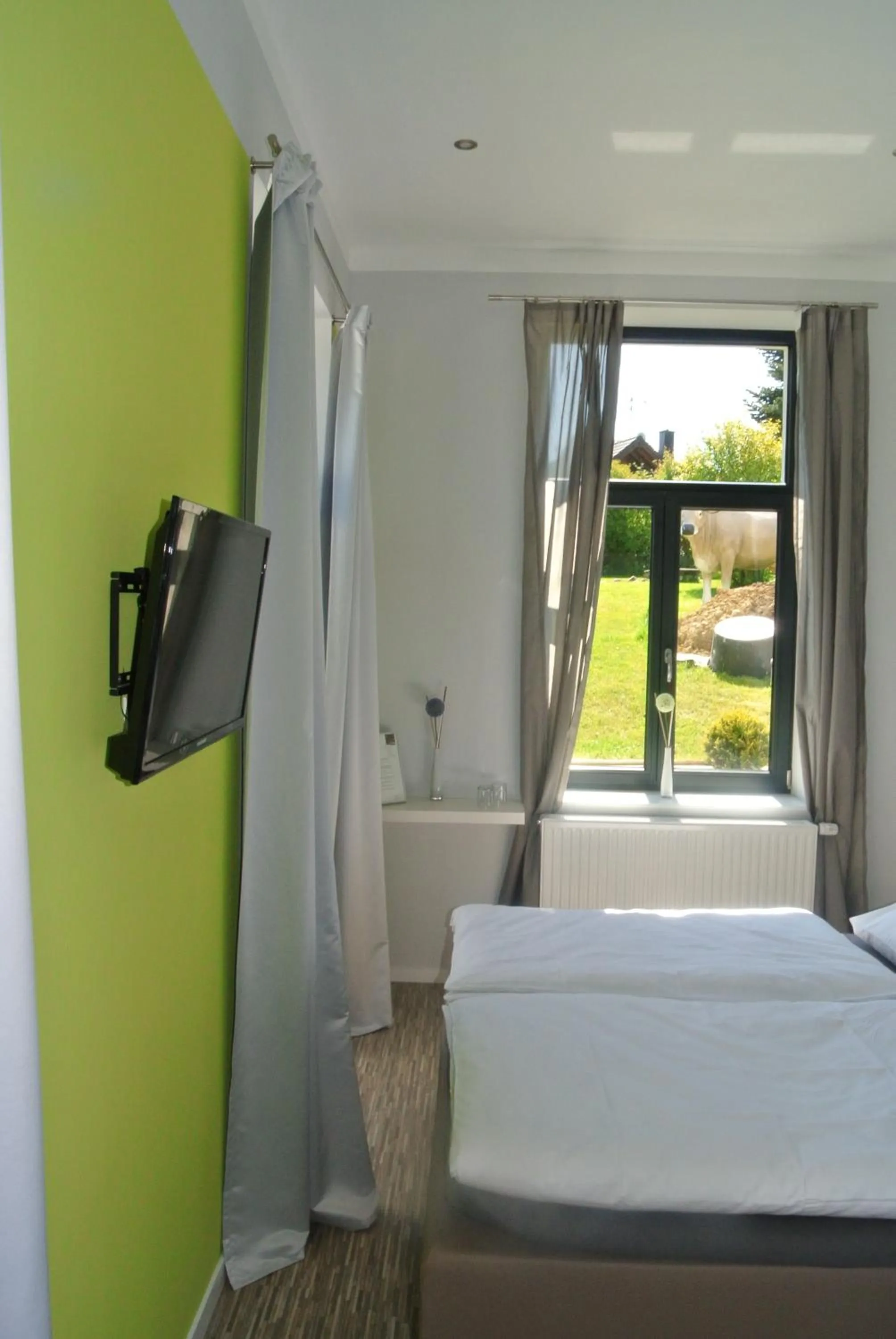 Bed in Gästehaus Tappes Hofgarten