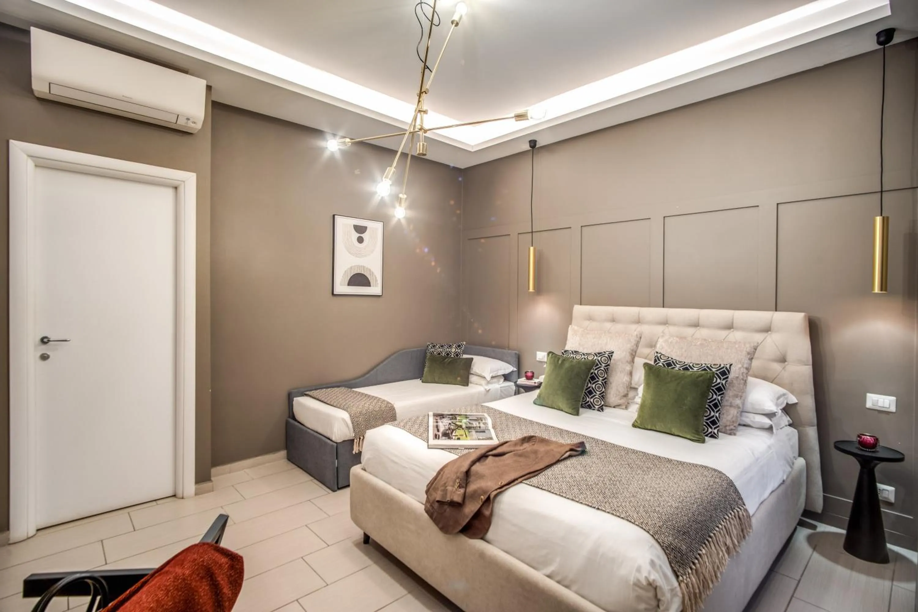 Bed in Borgognona Rooms