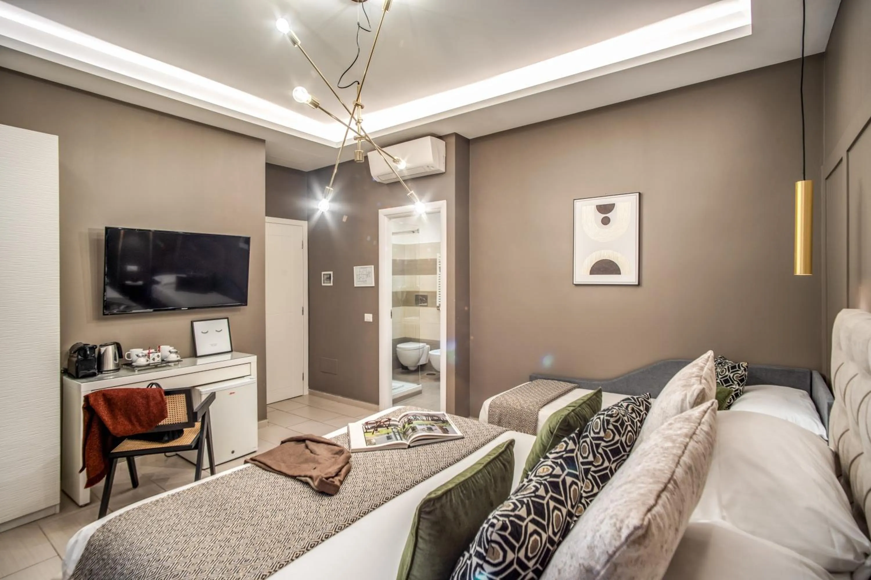 Bed in Borgognona Rooms